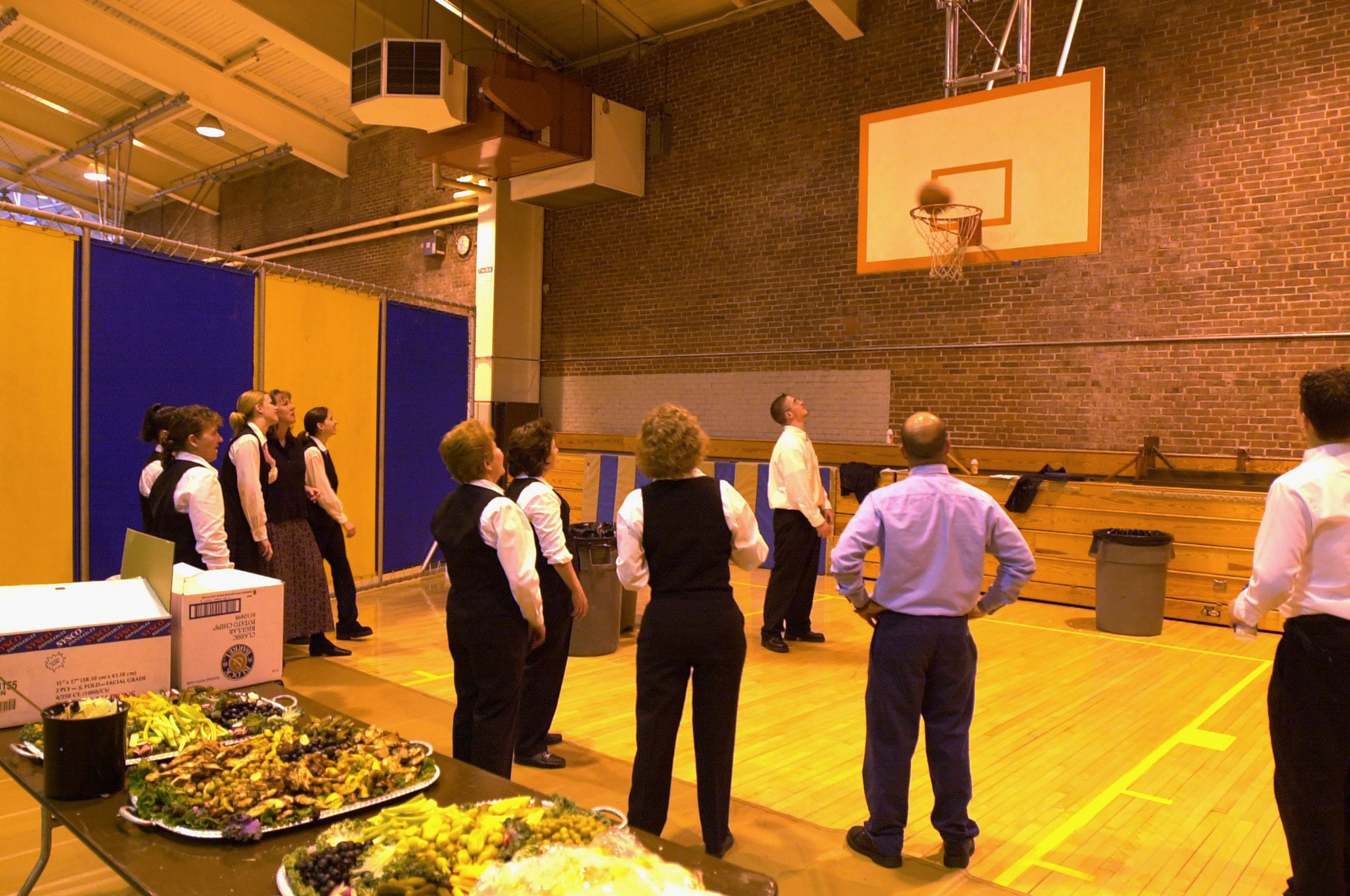 Basketball at the Choate gym in Wallingford Connecticut  Caters taking a break and shooting hoops