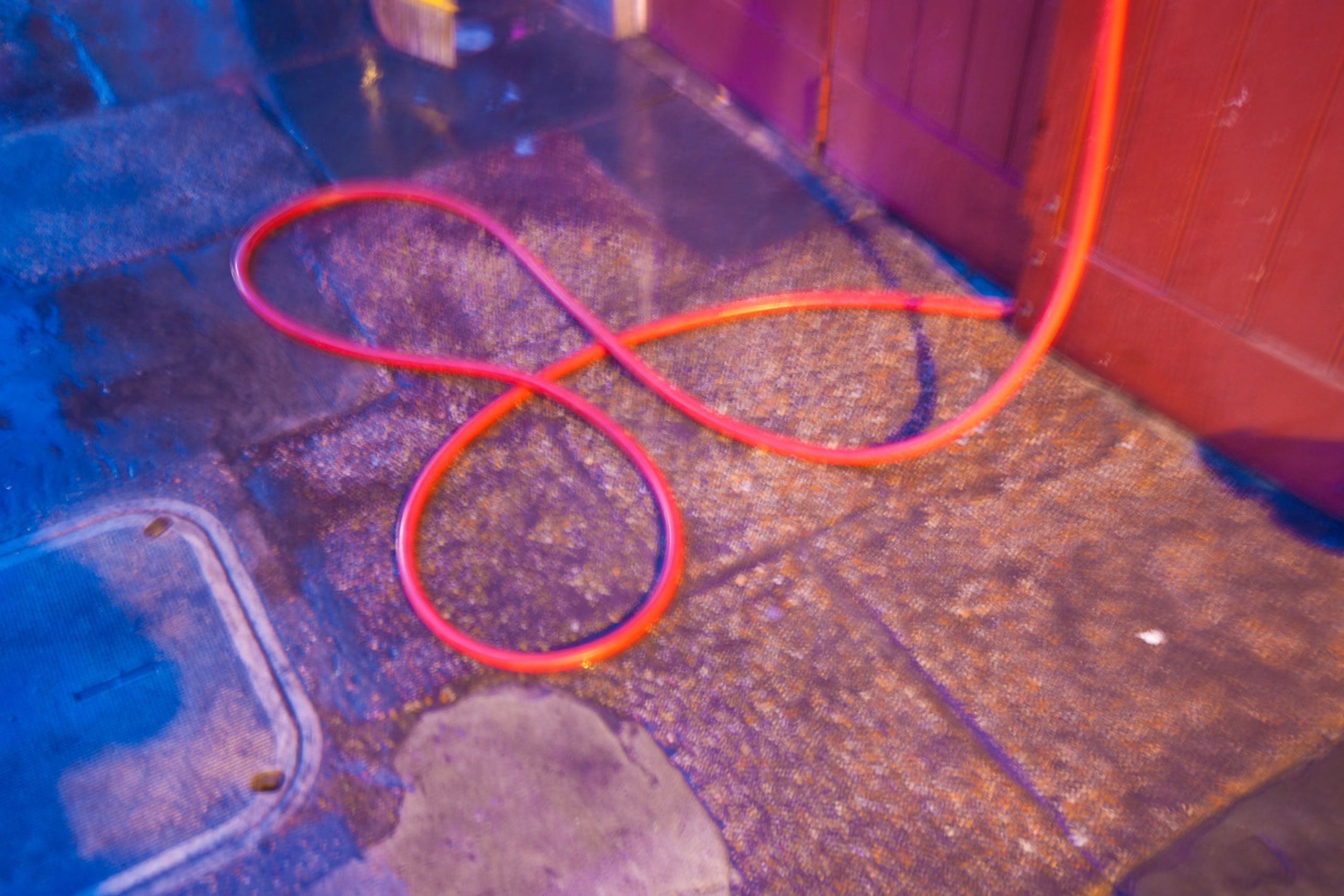 red hose on sidewalk in new Orleanss   Louisiana