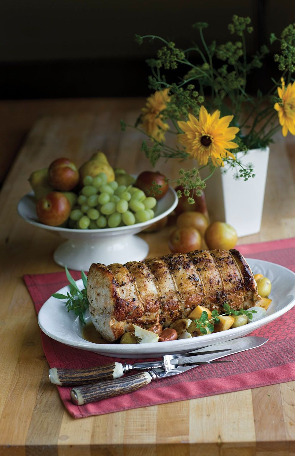 Stdio advertising photograph of pork roast on set