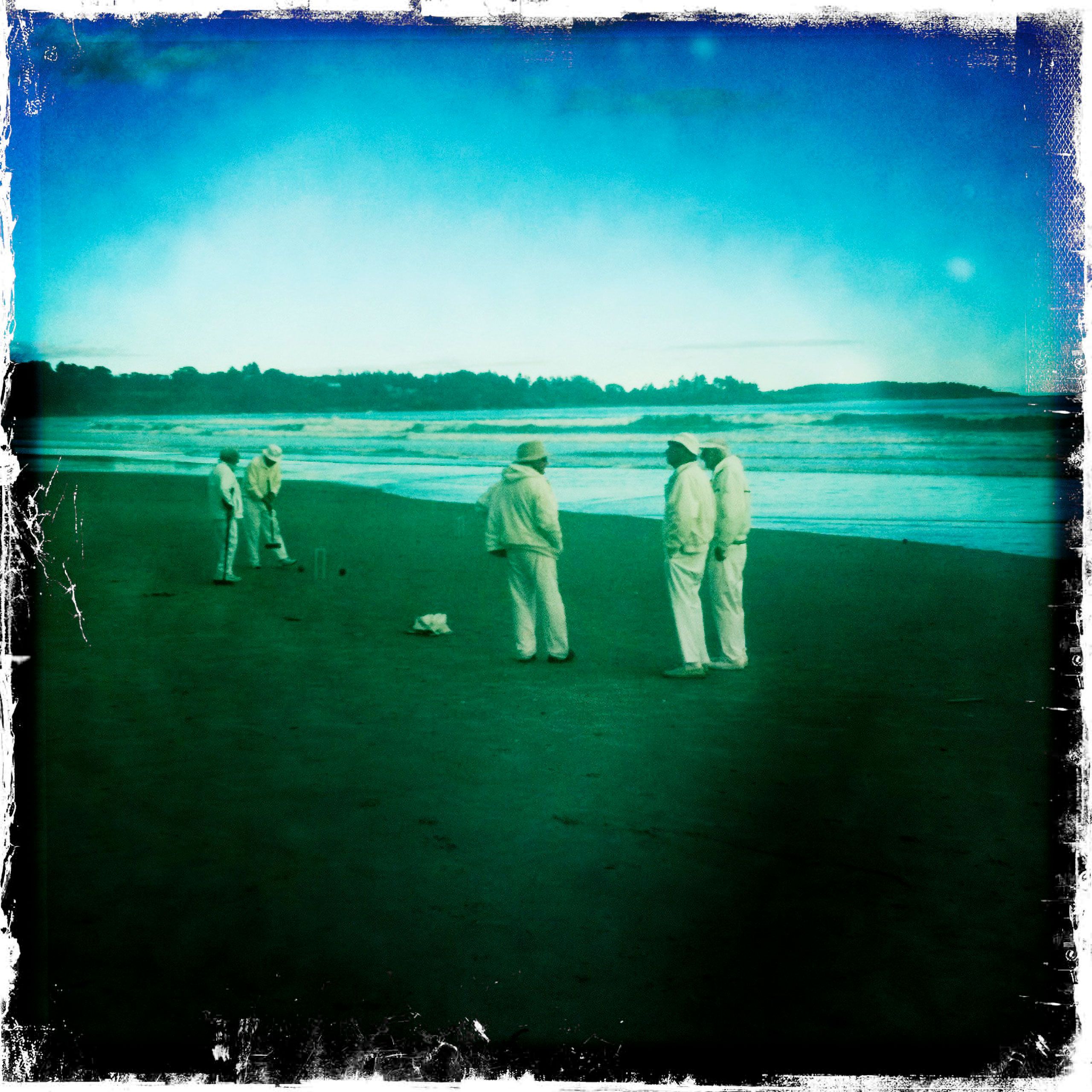 Playing croquet Higgins beach scarbrough maine