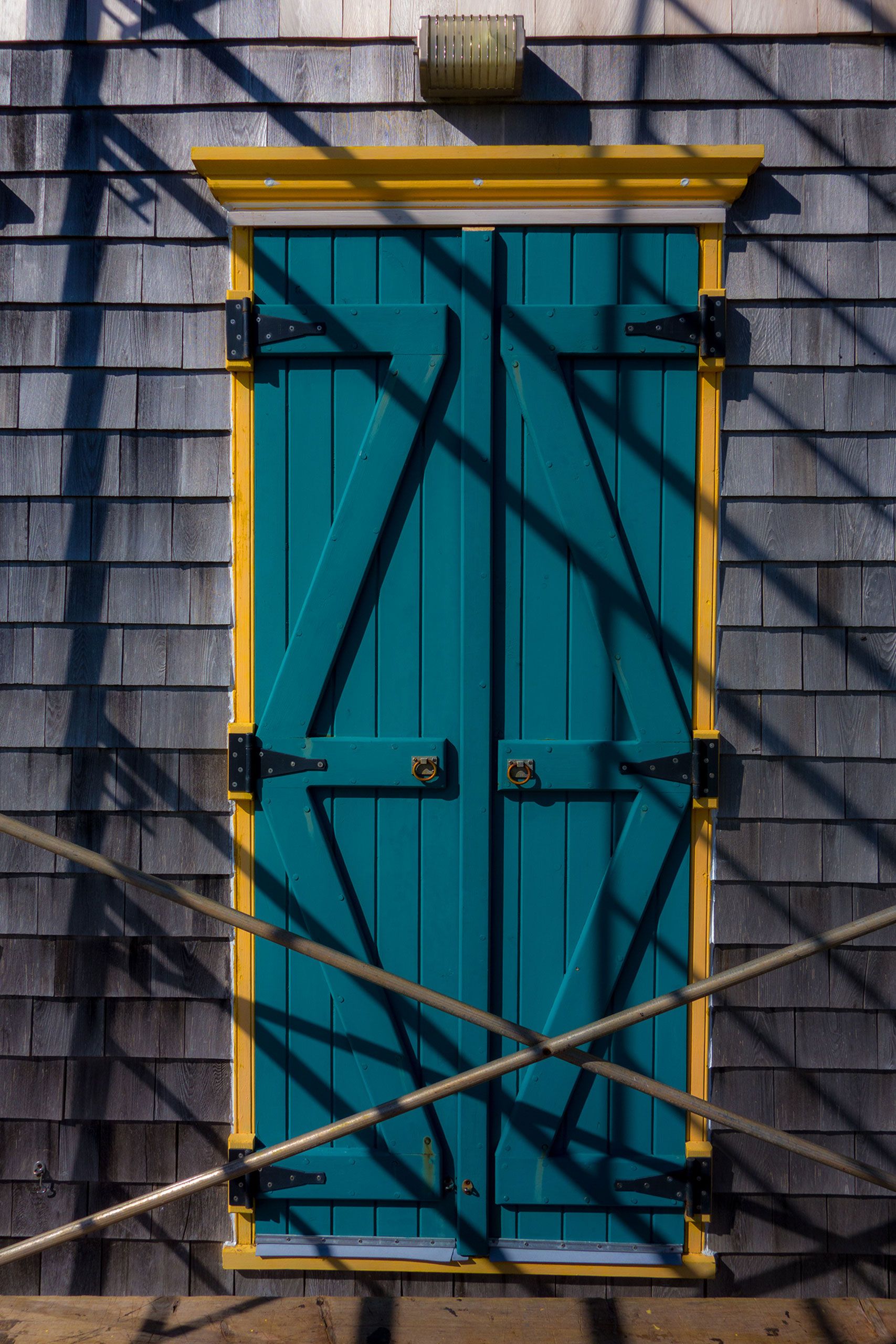 Magdalen Islands Îles de la Madeleine Harve Aubert Quebec Canada house getting worked on