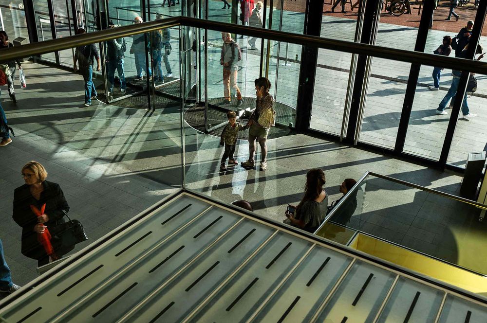 people in the lobby of the Stedelijk Museum Amsterdam 