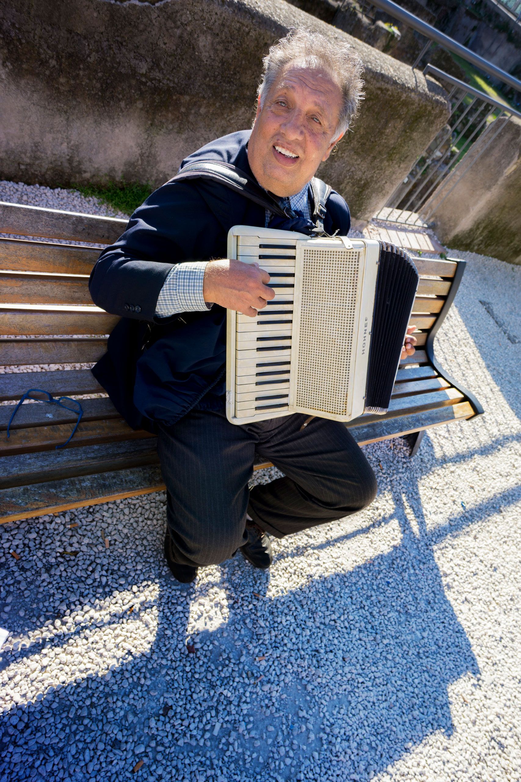 Man playing accrodain on street in Rome Itlay