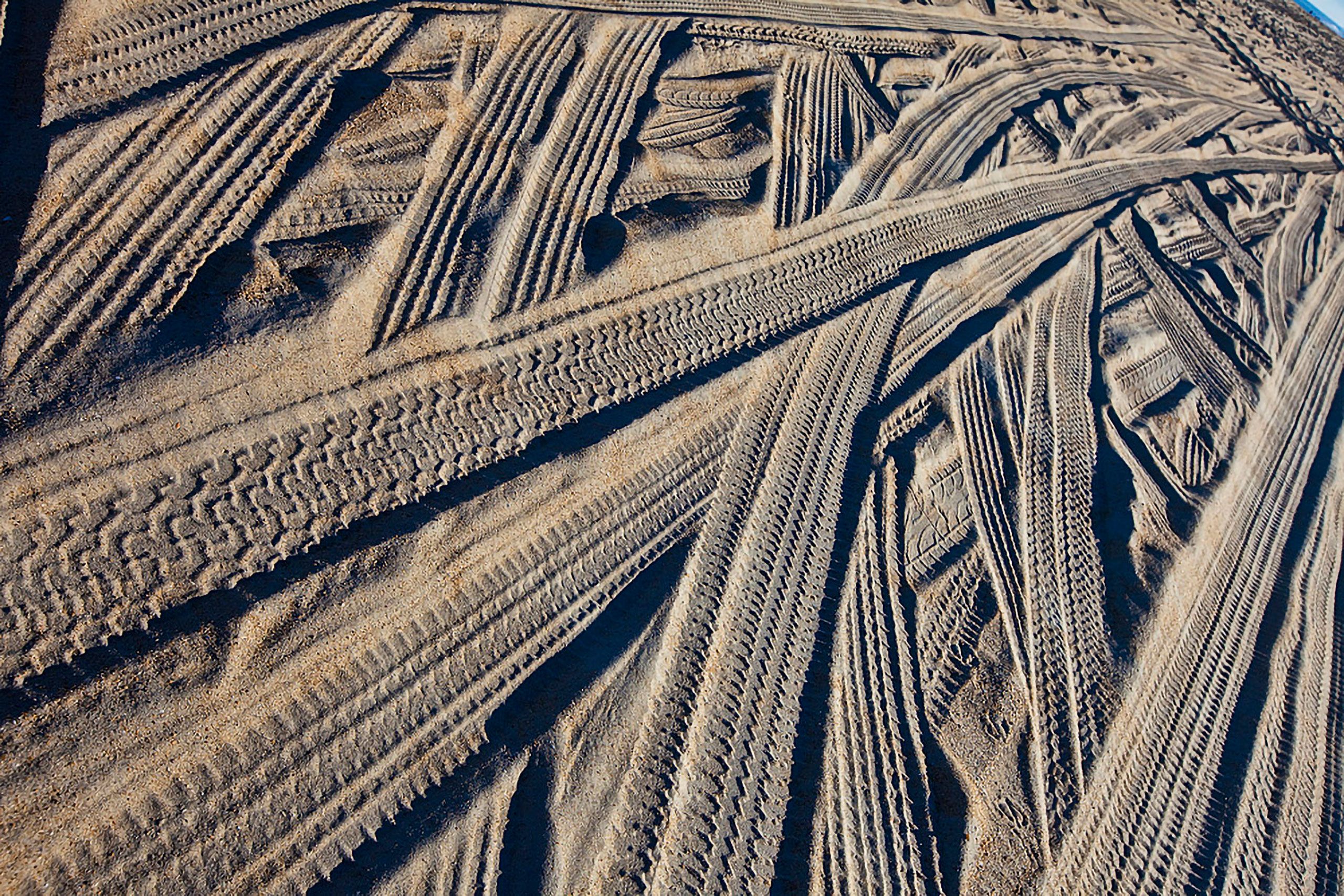 Tire tracks on beach hatters north carolina 