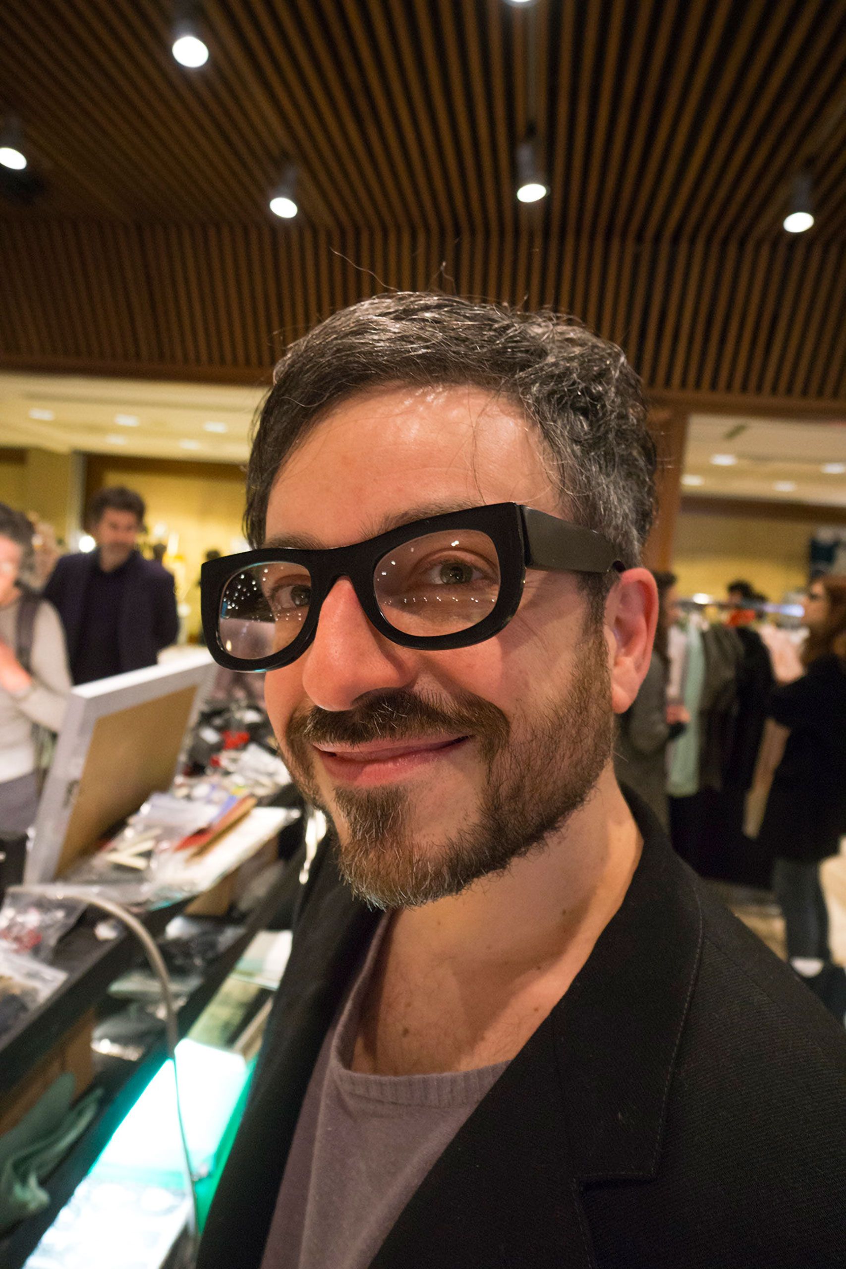 Young man wearing homemade glasses in Roe Italy 