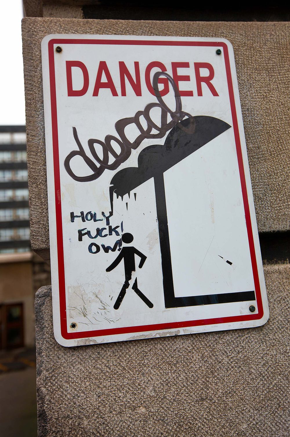 Graffiti at it’s best Danger warning. Holy fuck ouh waring for falling ice and water