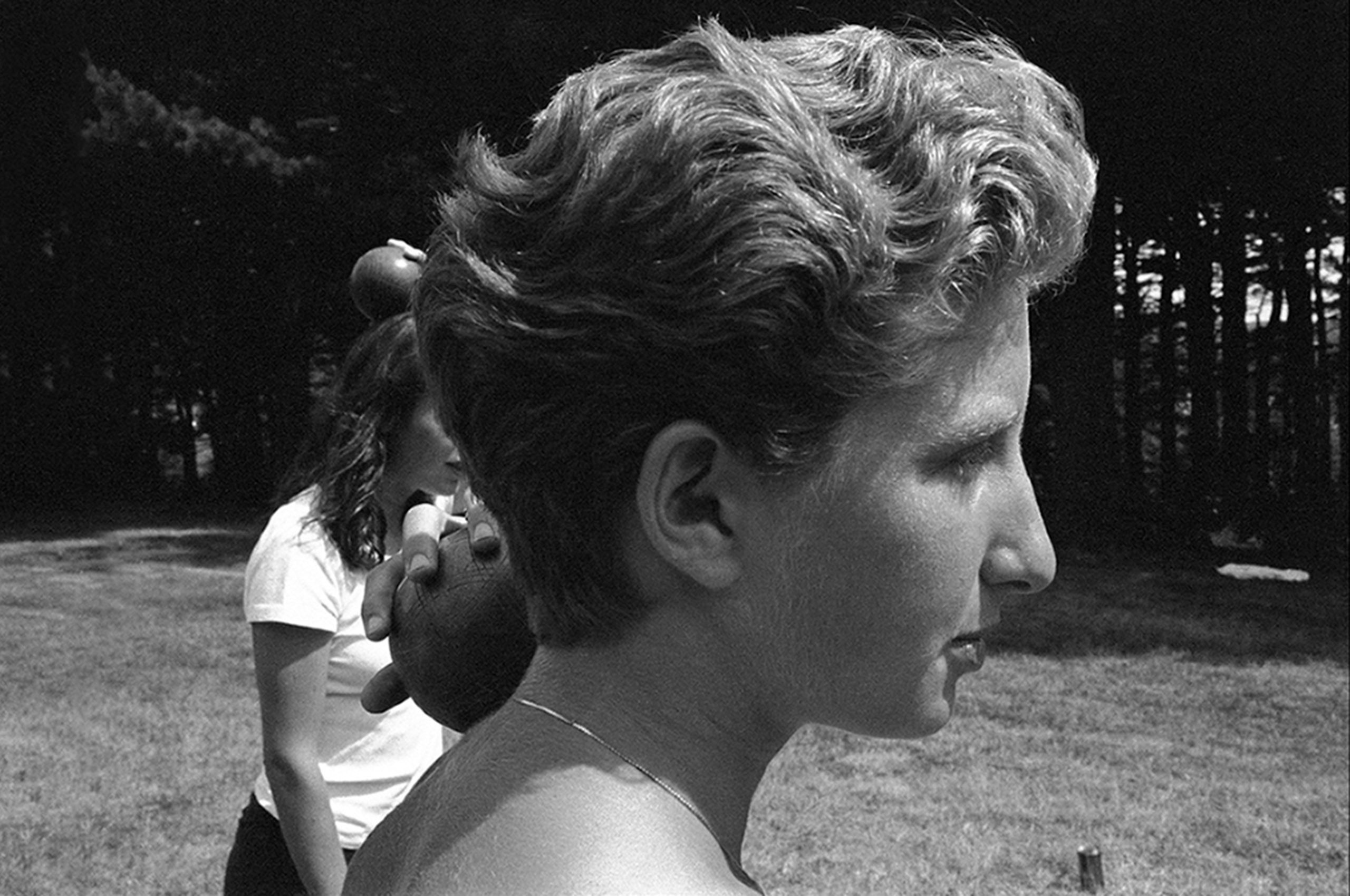 Woman playing bocci Silhouette profile portrait  B&W photo.