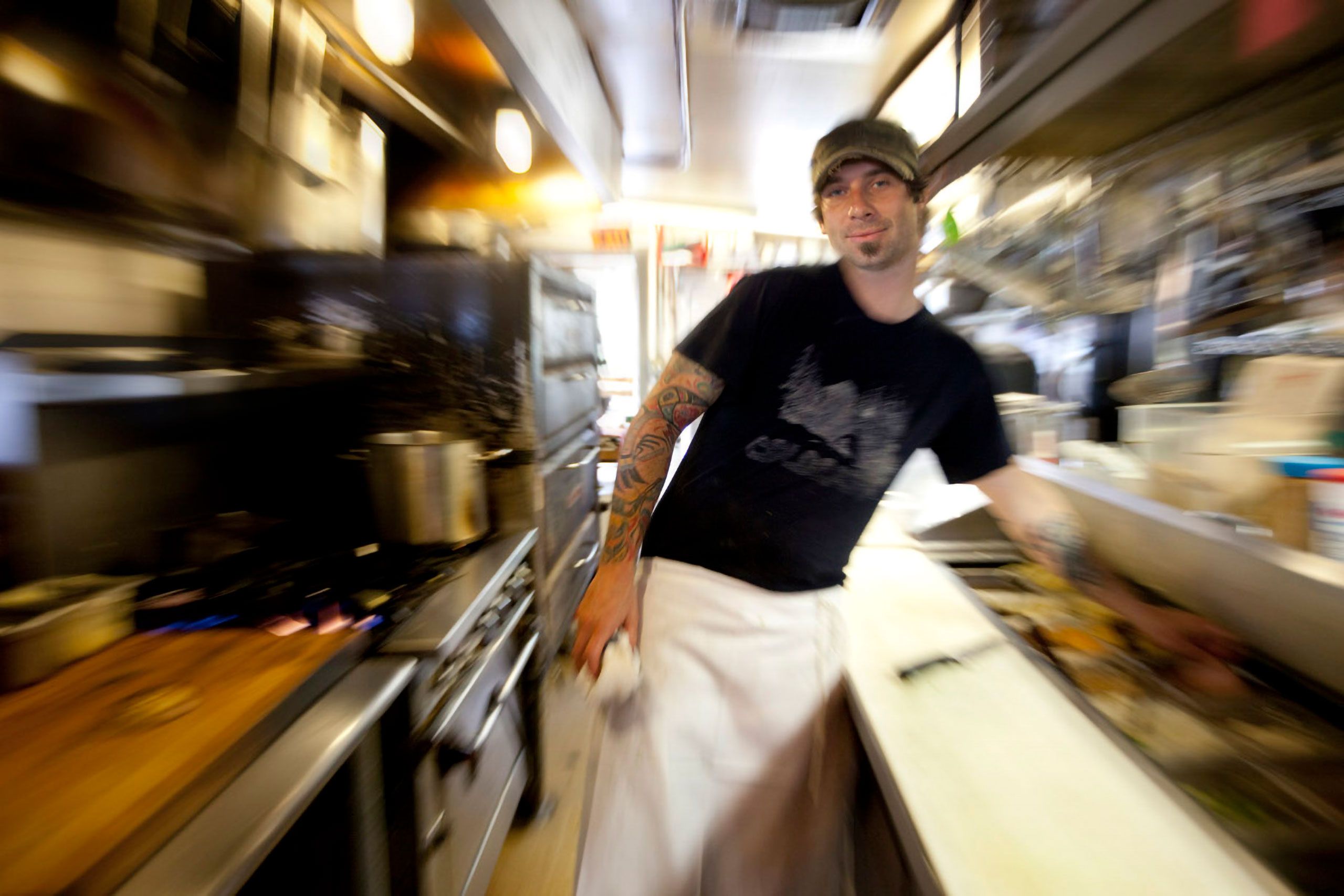 owner  Josh Potocki  in kitchen of 158 Pickett Street Cafe south portland maine