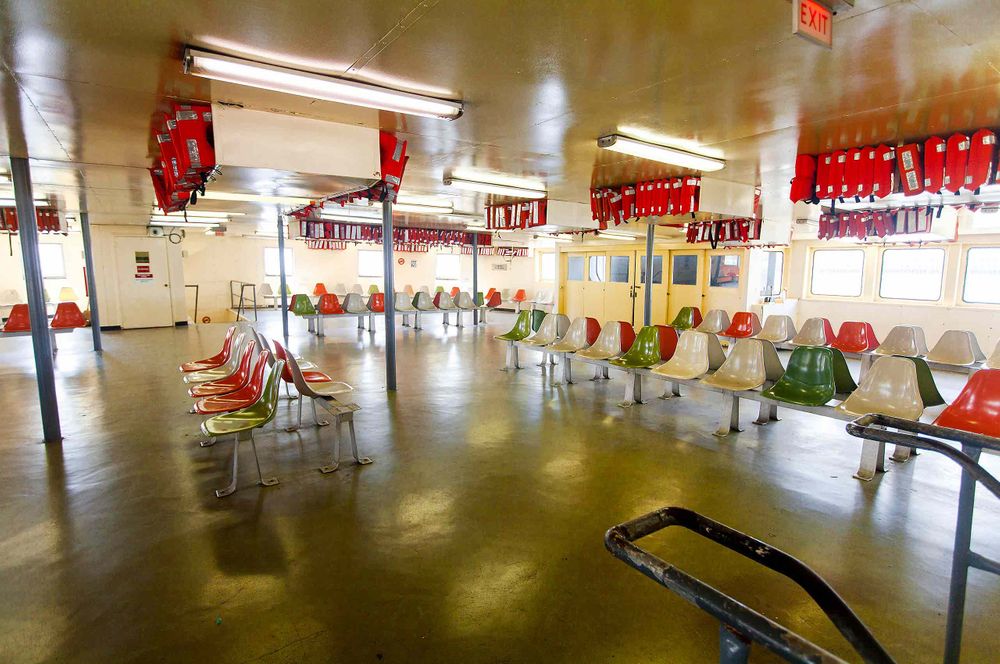 NOLA New Orleans Algiers Point Canal Street  Ferry inside waring room life vests 