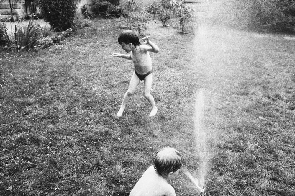 Jacob Bluestone Sam Roos playing with water cape Elizabeth Maine B&W street photography 1991  nineteen  nineties