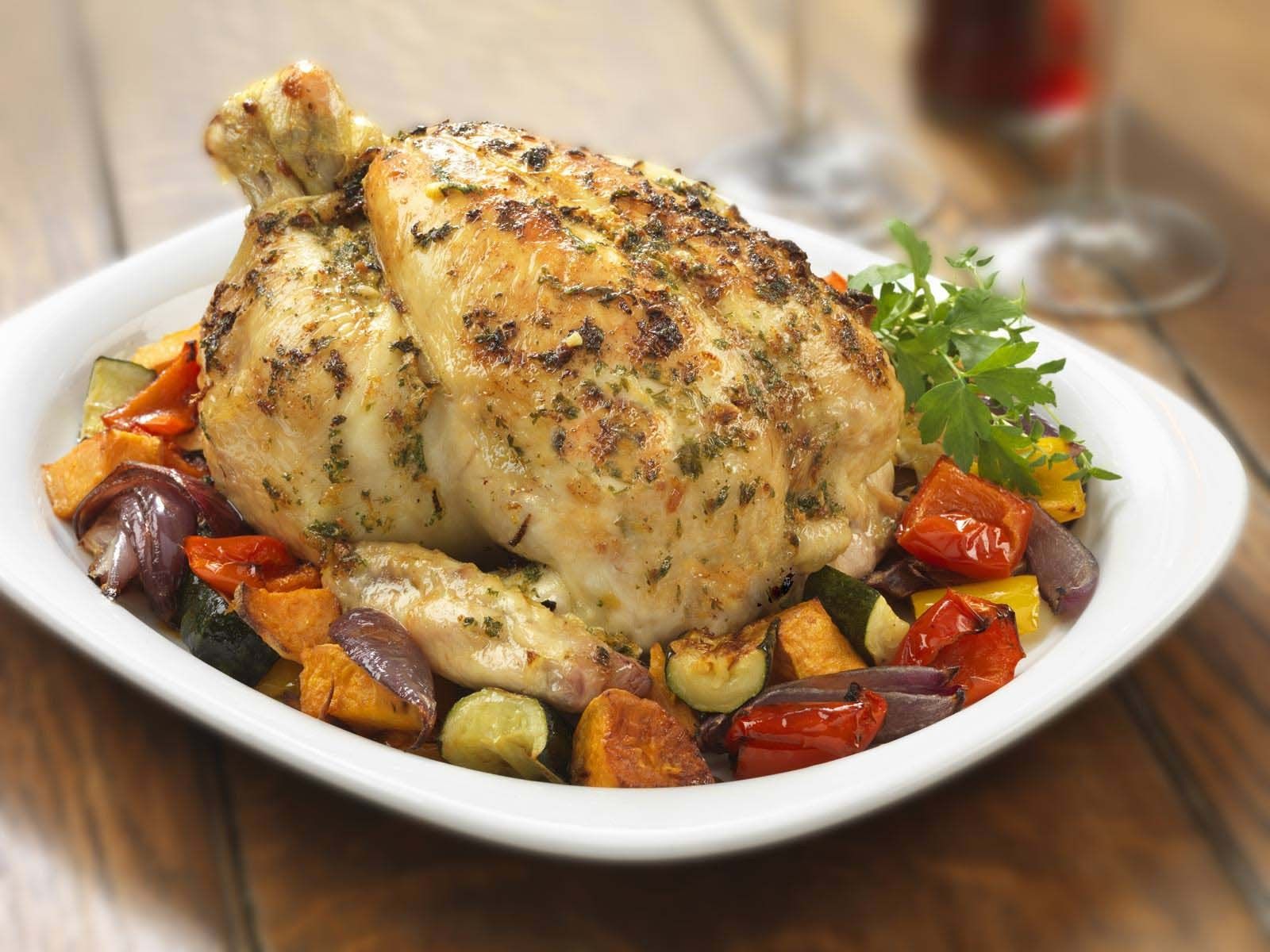 Whole Roast Chicken with vegetables.