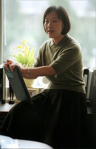 Asian Business Woman on desk