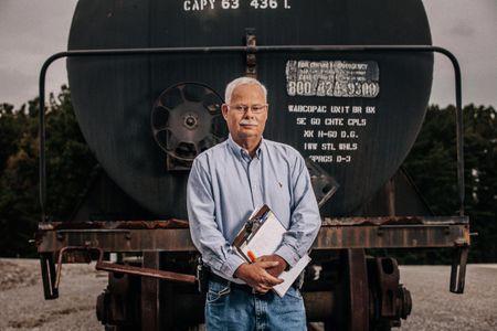 A photo of a Loss Control prevention person, instructor to train company people to mitigate a disaster as it relates to risk management in the insurance industry. Environmental portrait, and we are a industrial photographer, on location photographer & location commercial photographer. Instructor in Loss Control Prevention