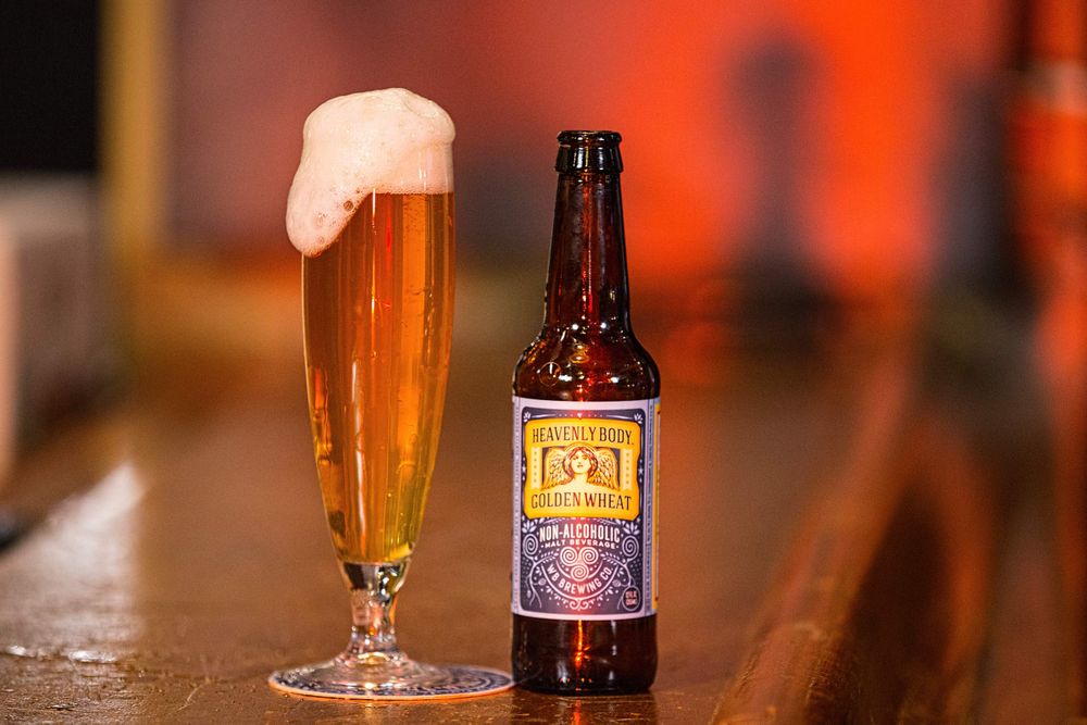 A beauty shot of a ice cold glass of WellBeing Heavenly Body non-alcoholic brew with from. WellBeing Heavenly Body Beauty Shot in a Glass