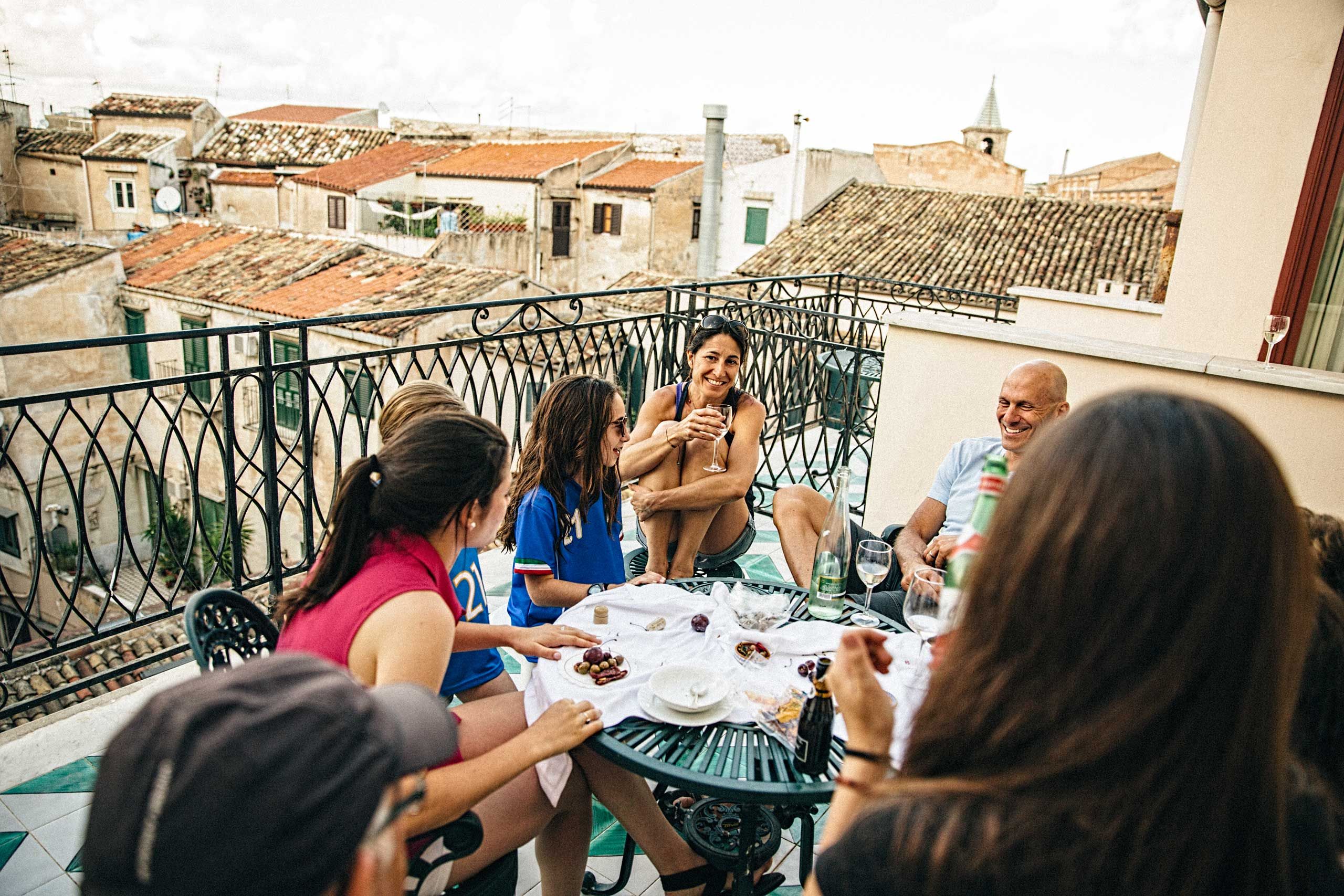 Family Eating ON a Balcony