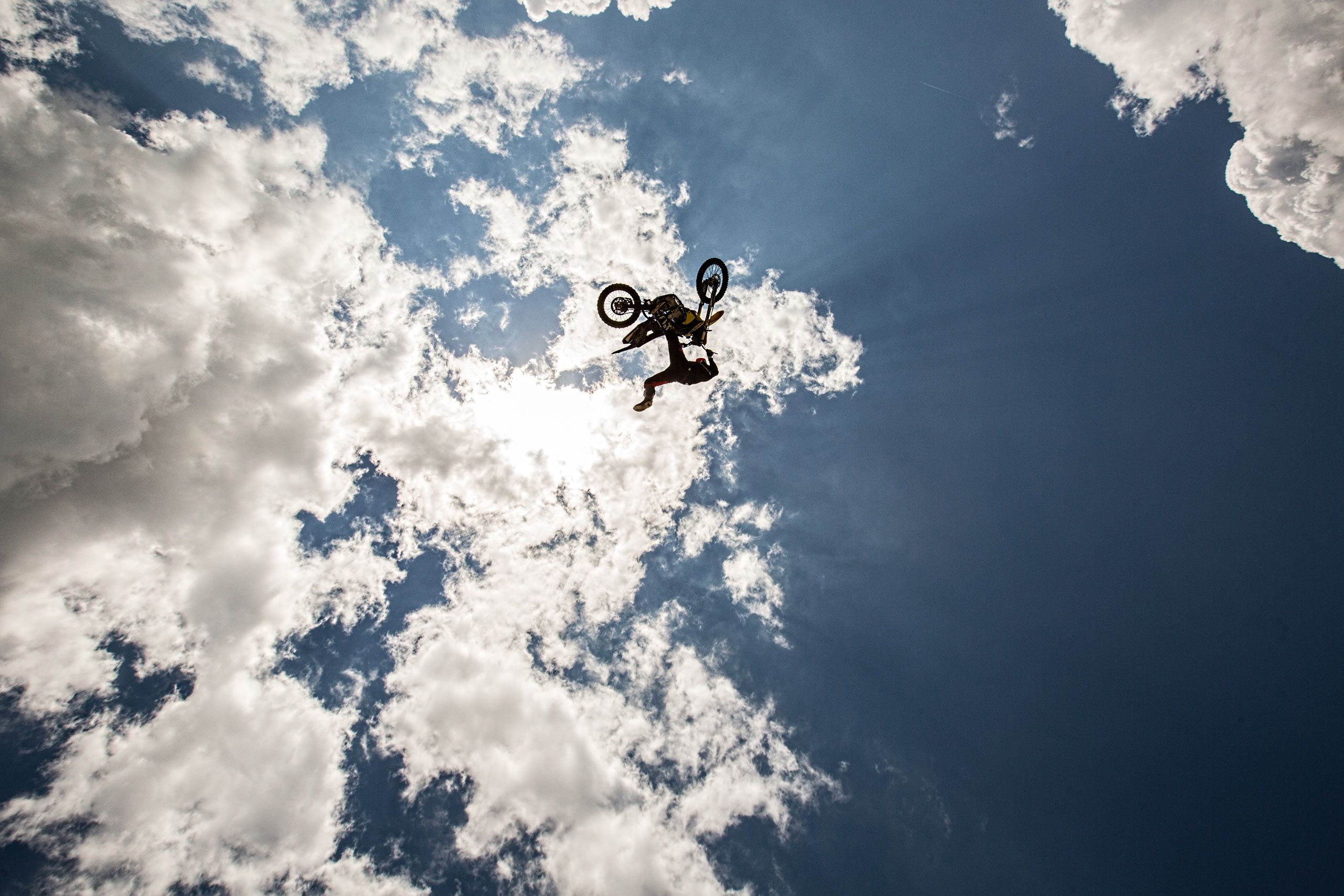 Motorcycle Performing a Stunt Sky High