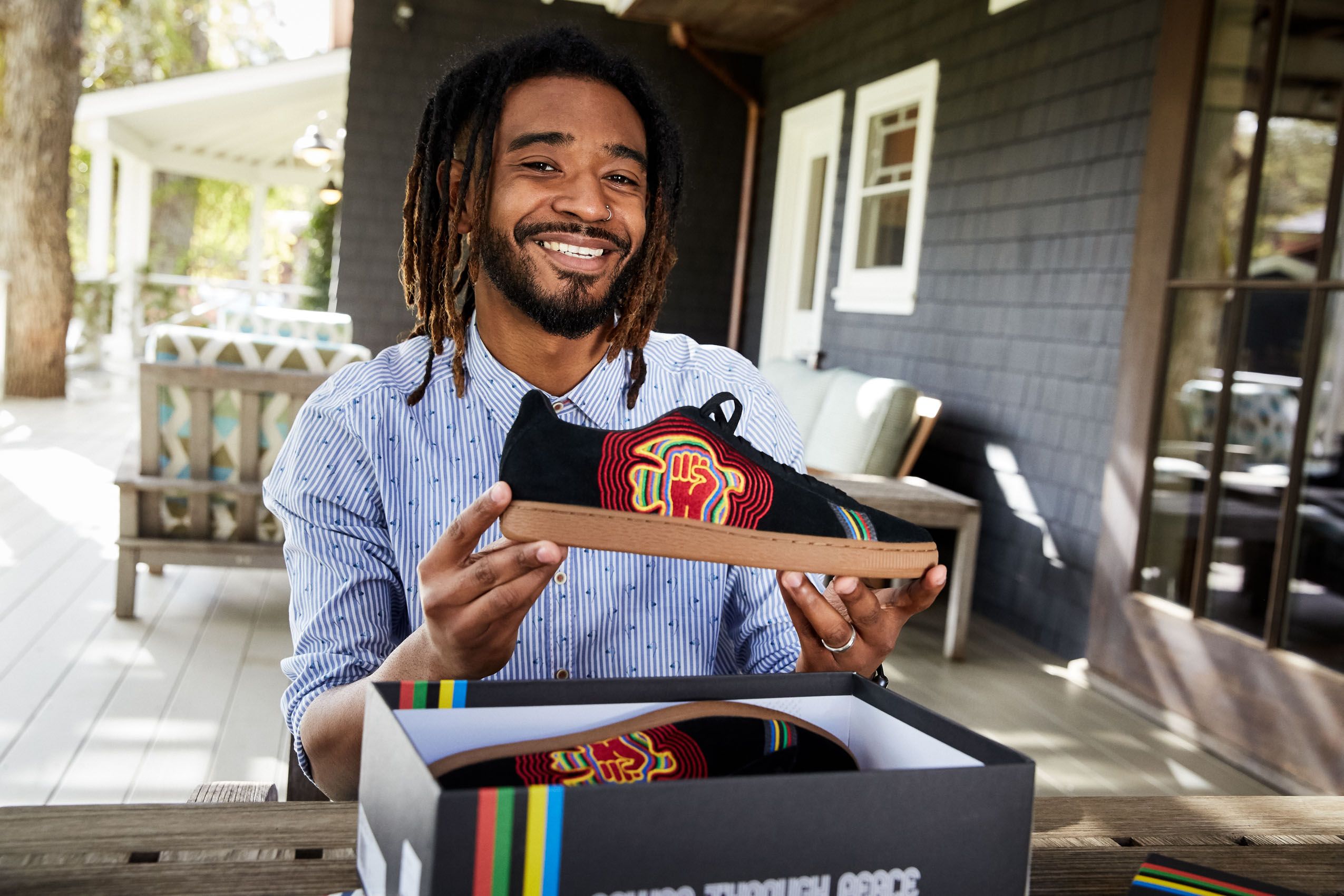 Man Smiling with Shoes