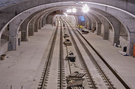 Photo of a long perspective of underground metro railroad tracks in St. Louis. Underground Train Tracks