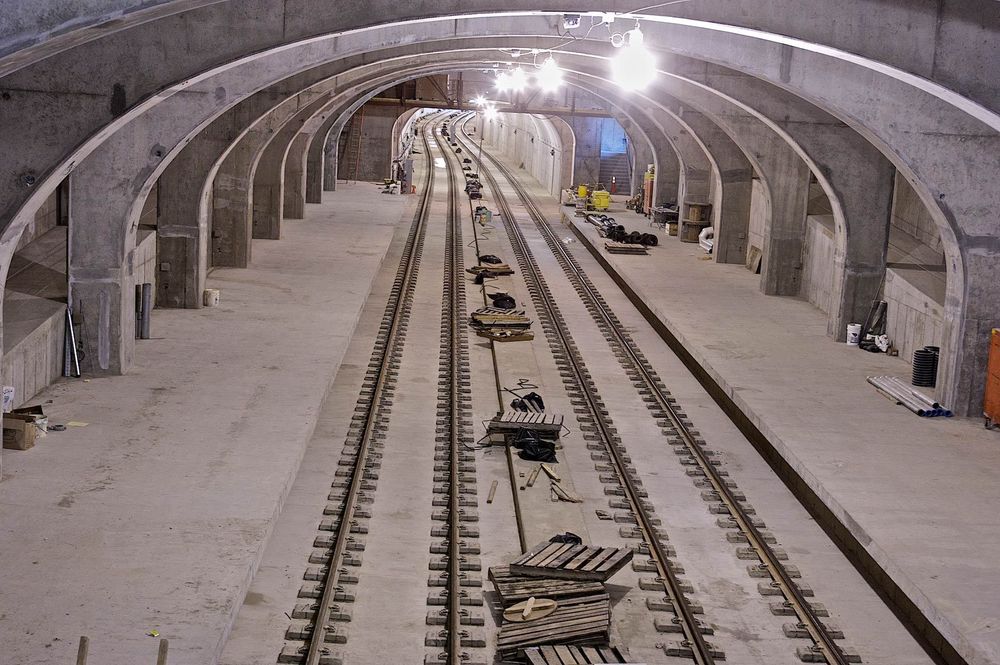 Photo of a long perspective of underground metro railroad tracks in St. Louis. Underground Train Tracks