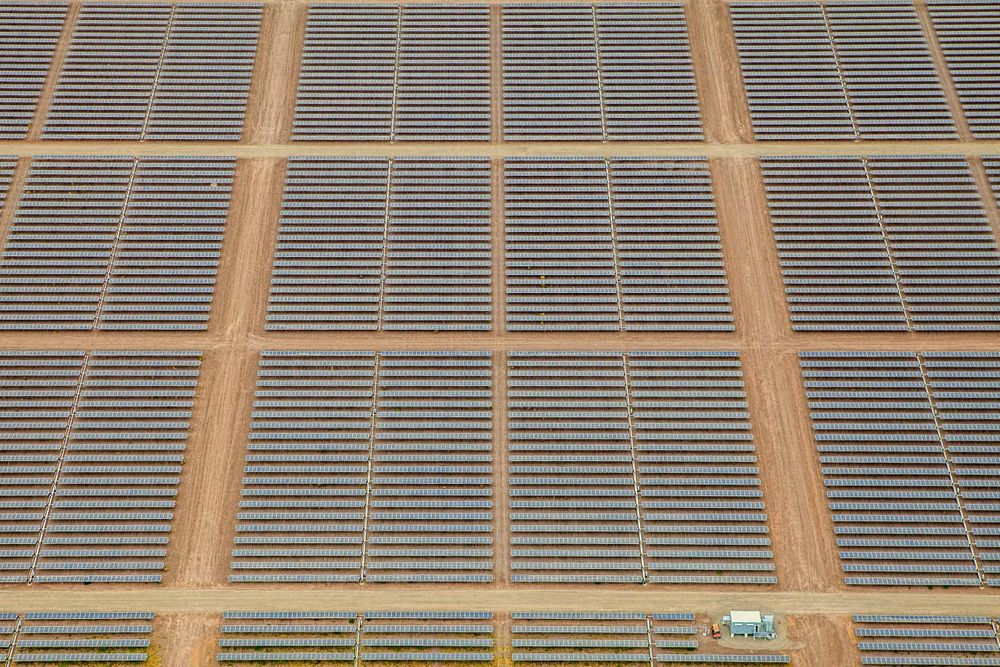 An graphic aerial photo and grid of a huge solar farm in the midst of the solar panels. This project was shooting a solar farm near El Centro, California, which is located right on the Mexico border. It will provide good clean, off the grid, green energy for many areas in southern California. As an industrial photographer, on location photographer & location commercial photographer this project was superb! A Graphic Aerial View of a Solar Field