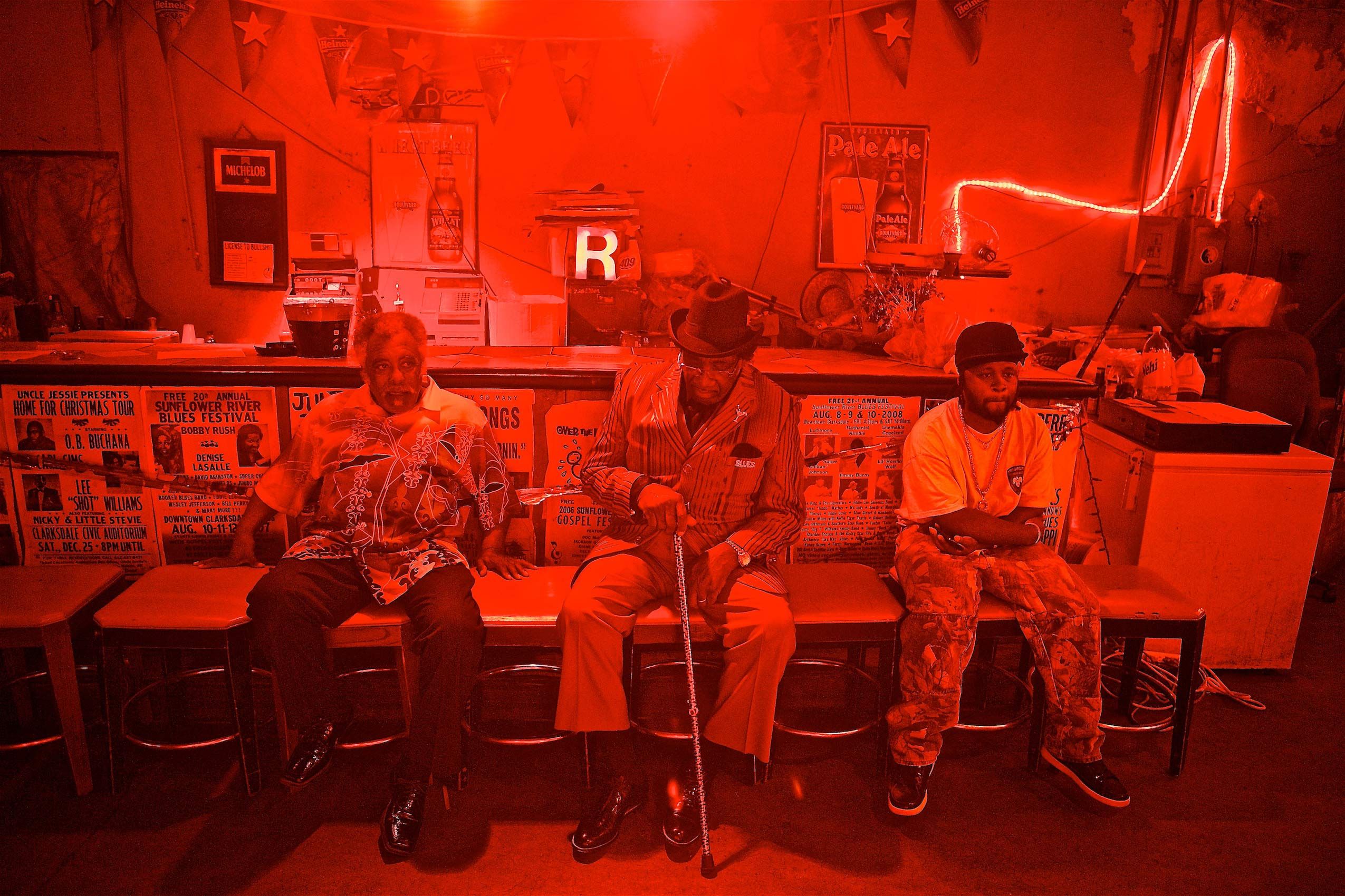 Three Men on a Stool at Red's Lounge Juke Joint