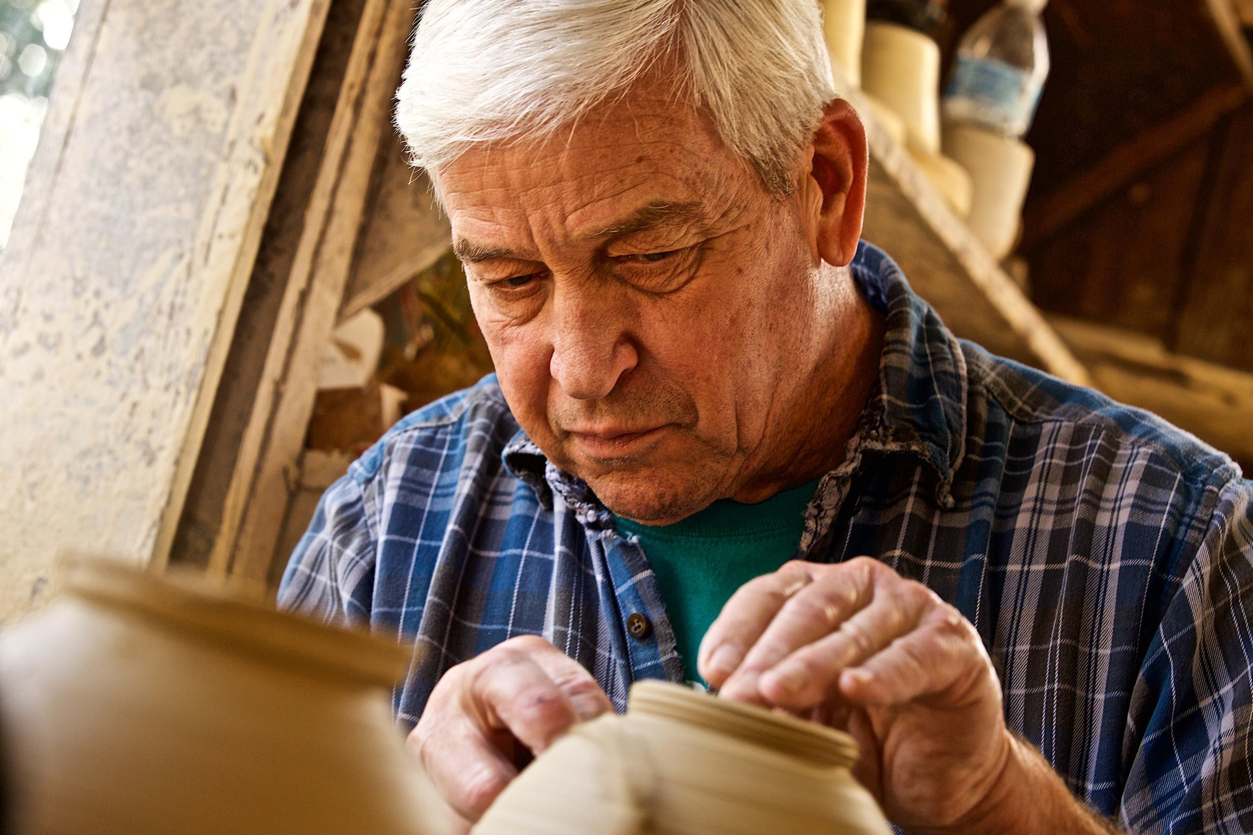 Older Man Working on a Pottery Wheel