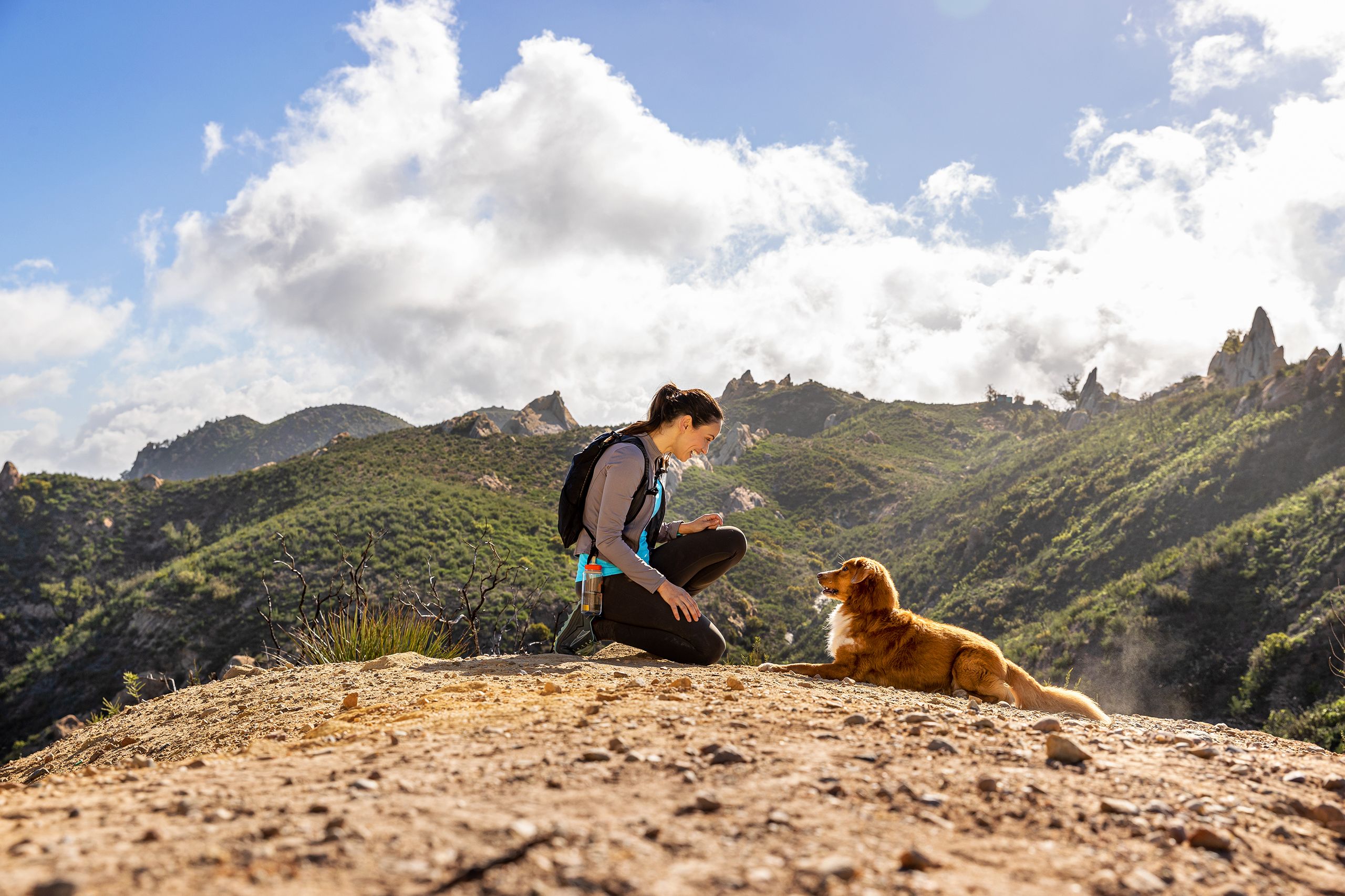 Woman and Dog on Hike