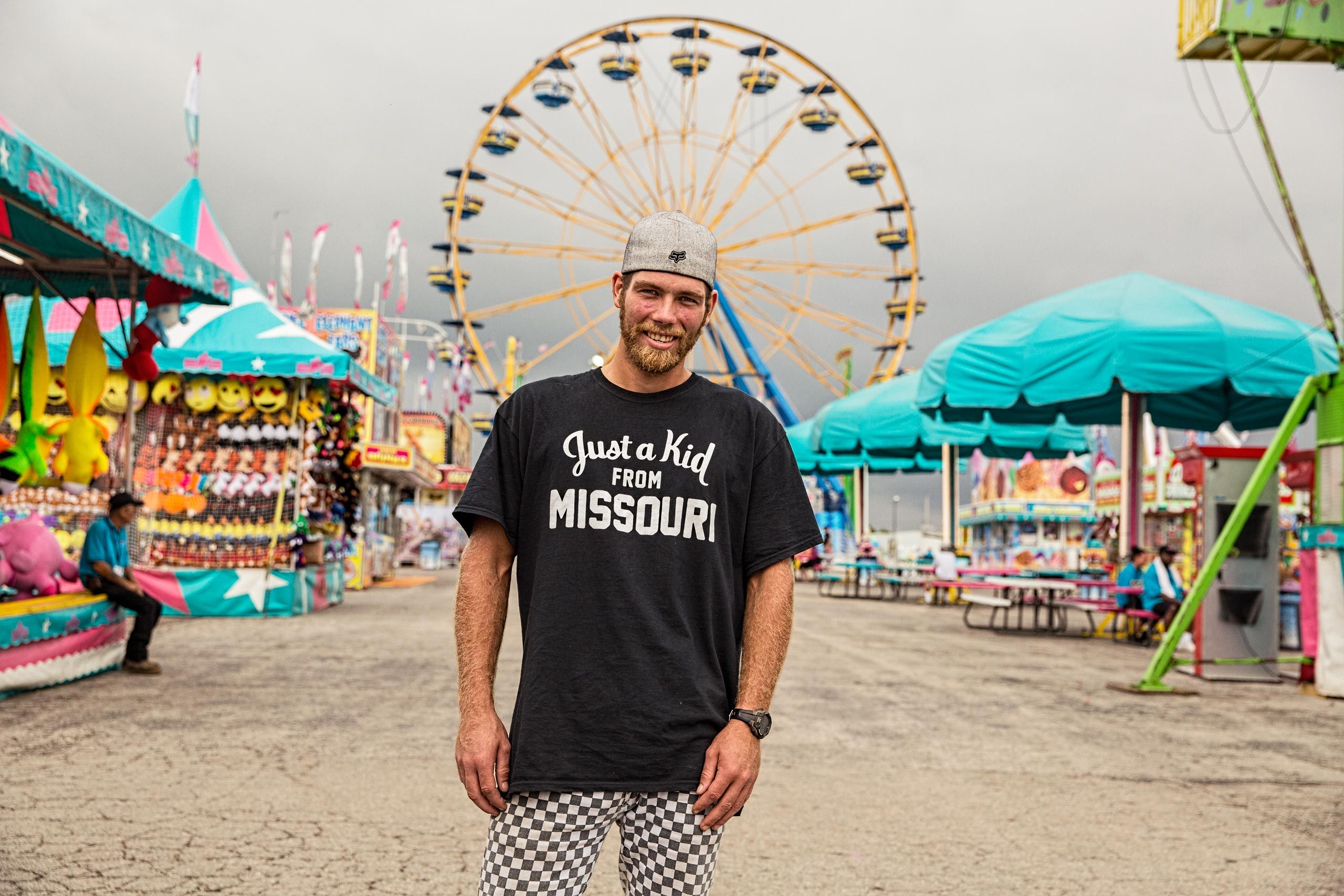 Man At a Fair Wearing "Just A Kid From Missouri" T-Shirt