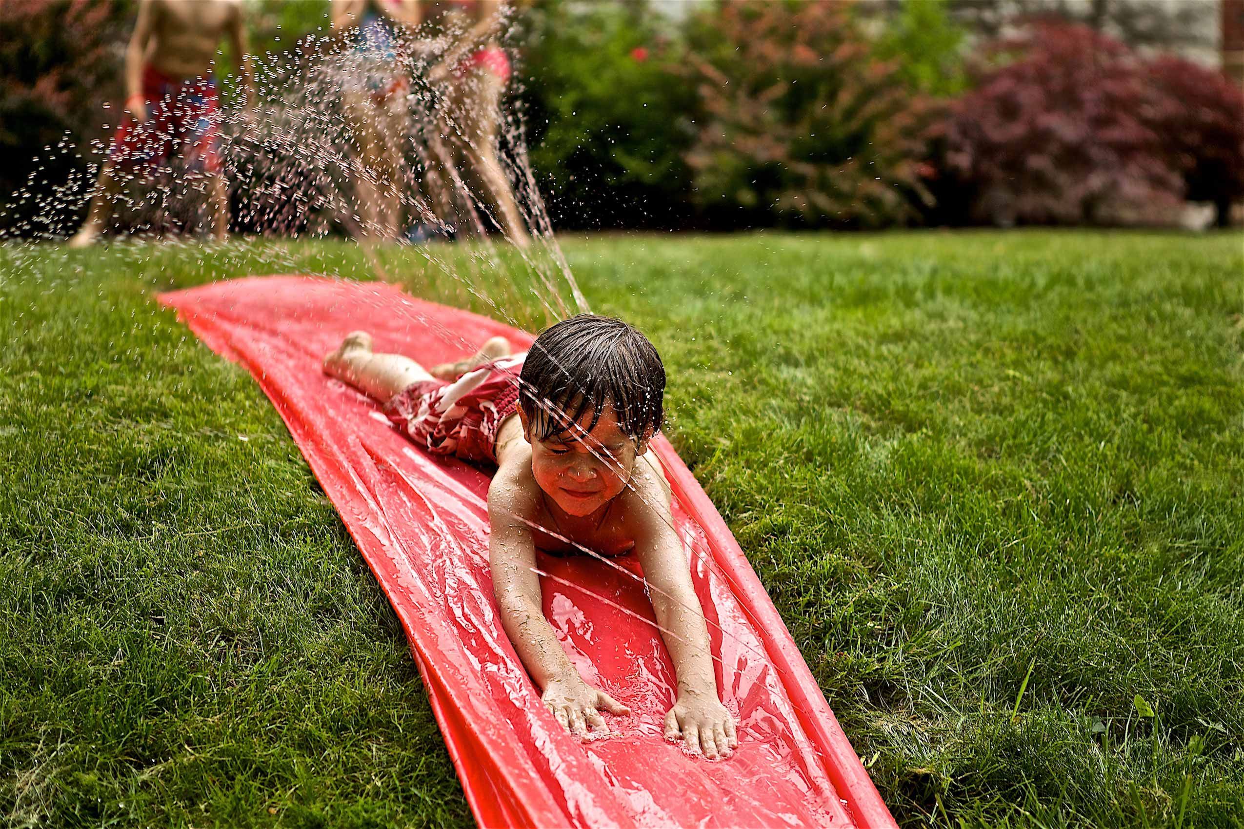 Boy on a Water Slide