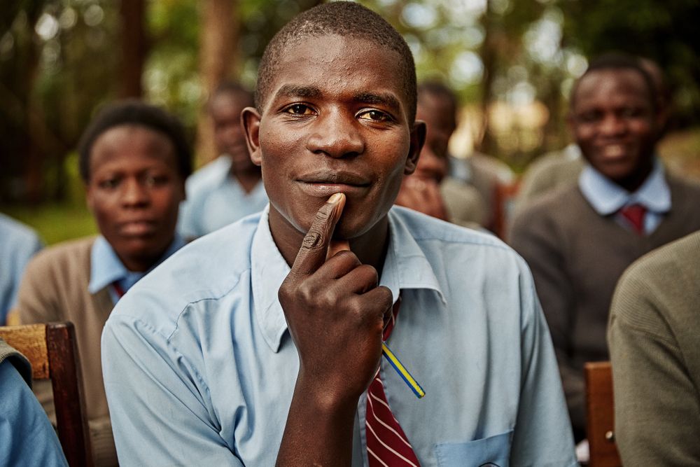 Secondary school boy looking into the camera for the African Teacher Foundation: The kids were studying for a very intense, make or break exam called the KCSE examination. MaleStudentLookingIntoCamera.jpg