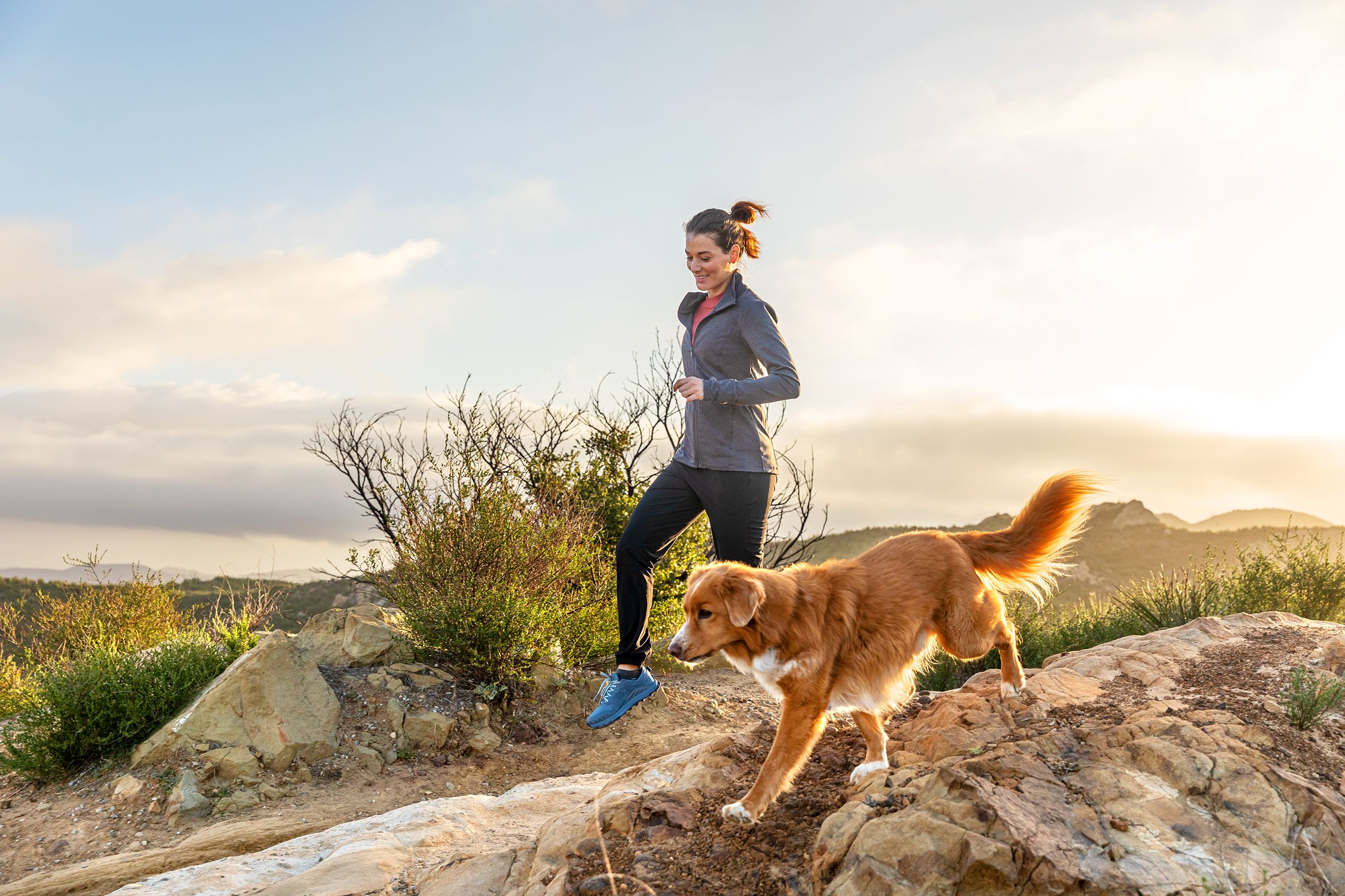 Woman Jogging With Dog