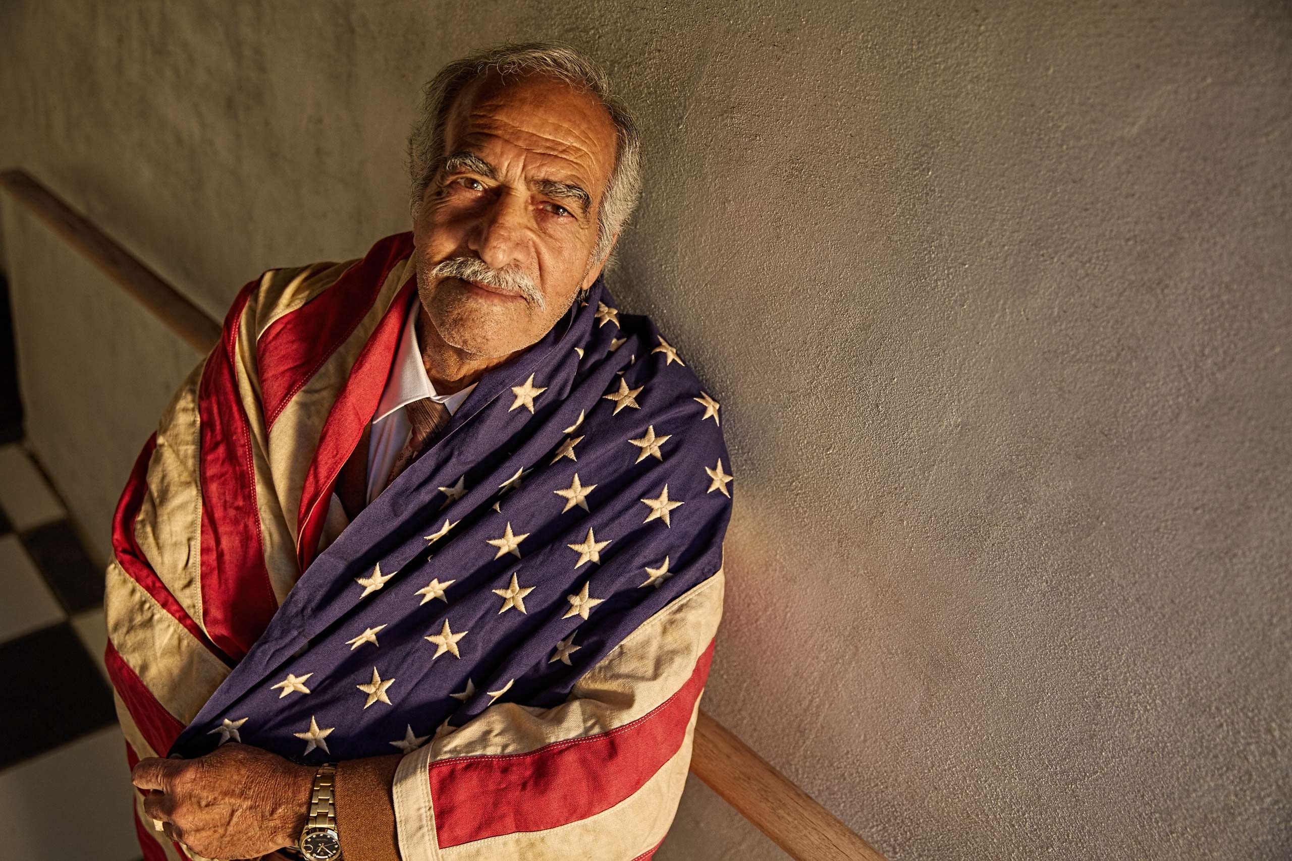 Man Wrapped in American Flag