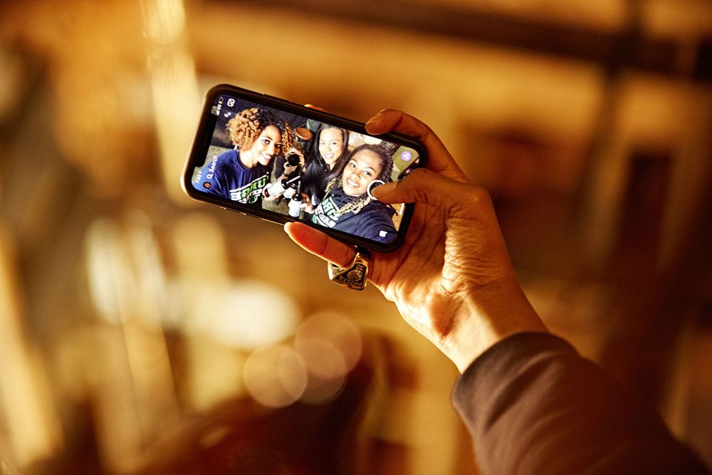 A selfie photo of a few championship basketball player from the St. Louis Surge women's basket ball team. It's a photo of a photo;) Selfie