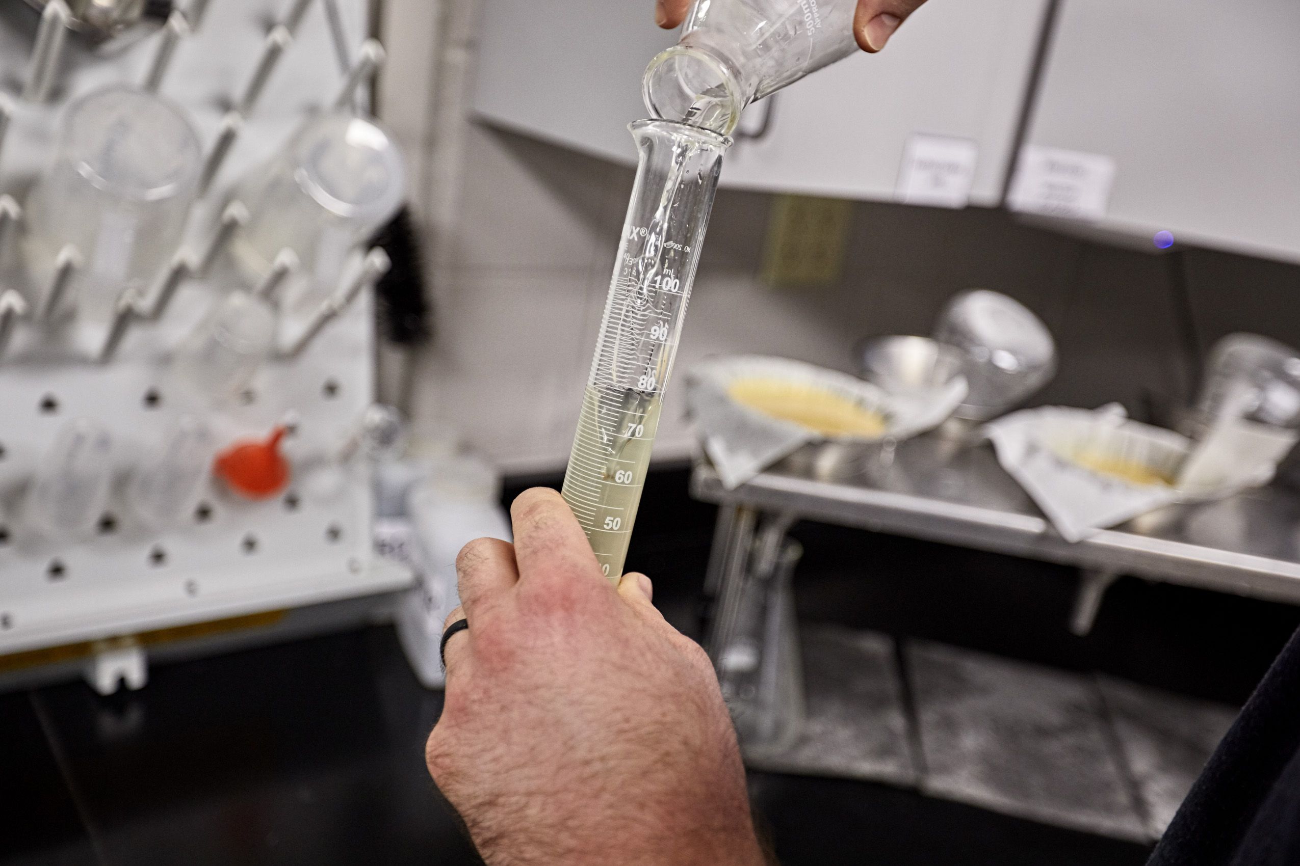 Pouring Liquid in Test Tube