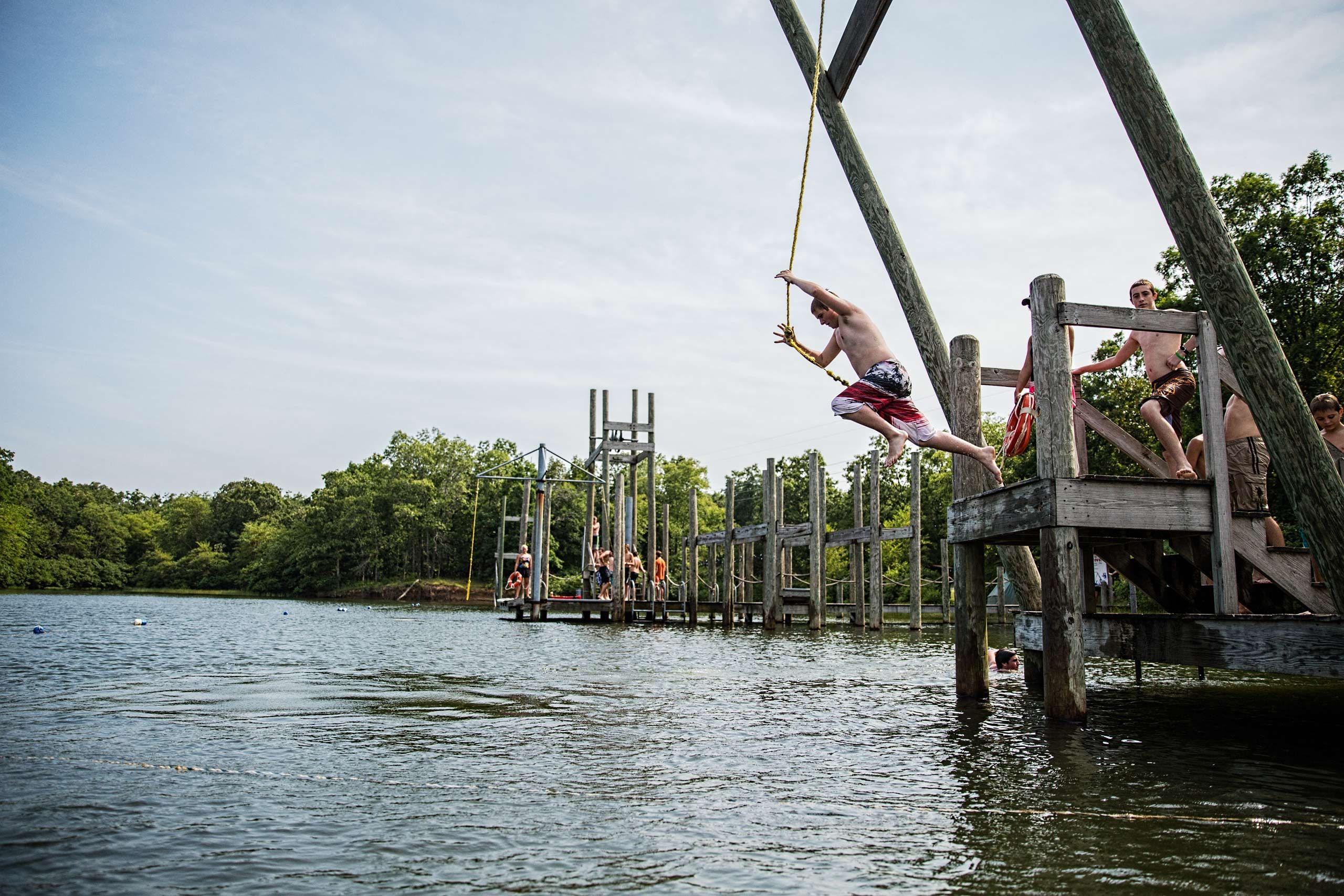 Photo of Bay Scout Jumping off a Dock