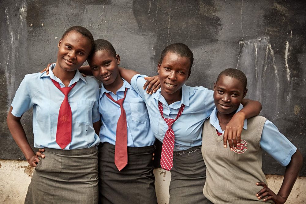 Four female classmates posing and looking into the camera. FemaleSchoolFriends.jpg
