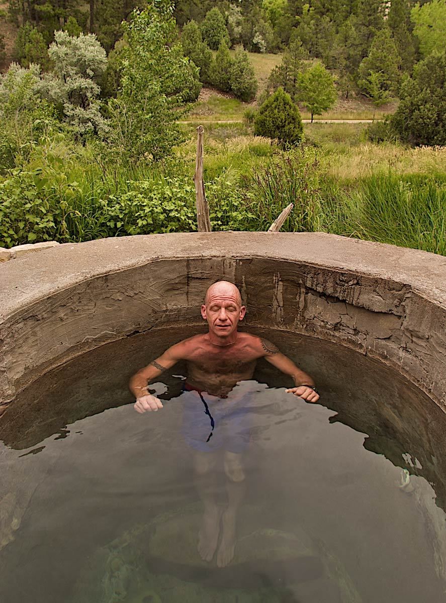 Man Relaxing In Natural Hot Spring