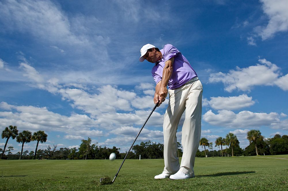 Lou Bopp Lifestyle photography man hitting golf ball Lou-Bopp-Lifestyle-photography -man-hitting-golf-ball
