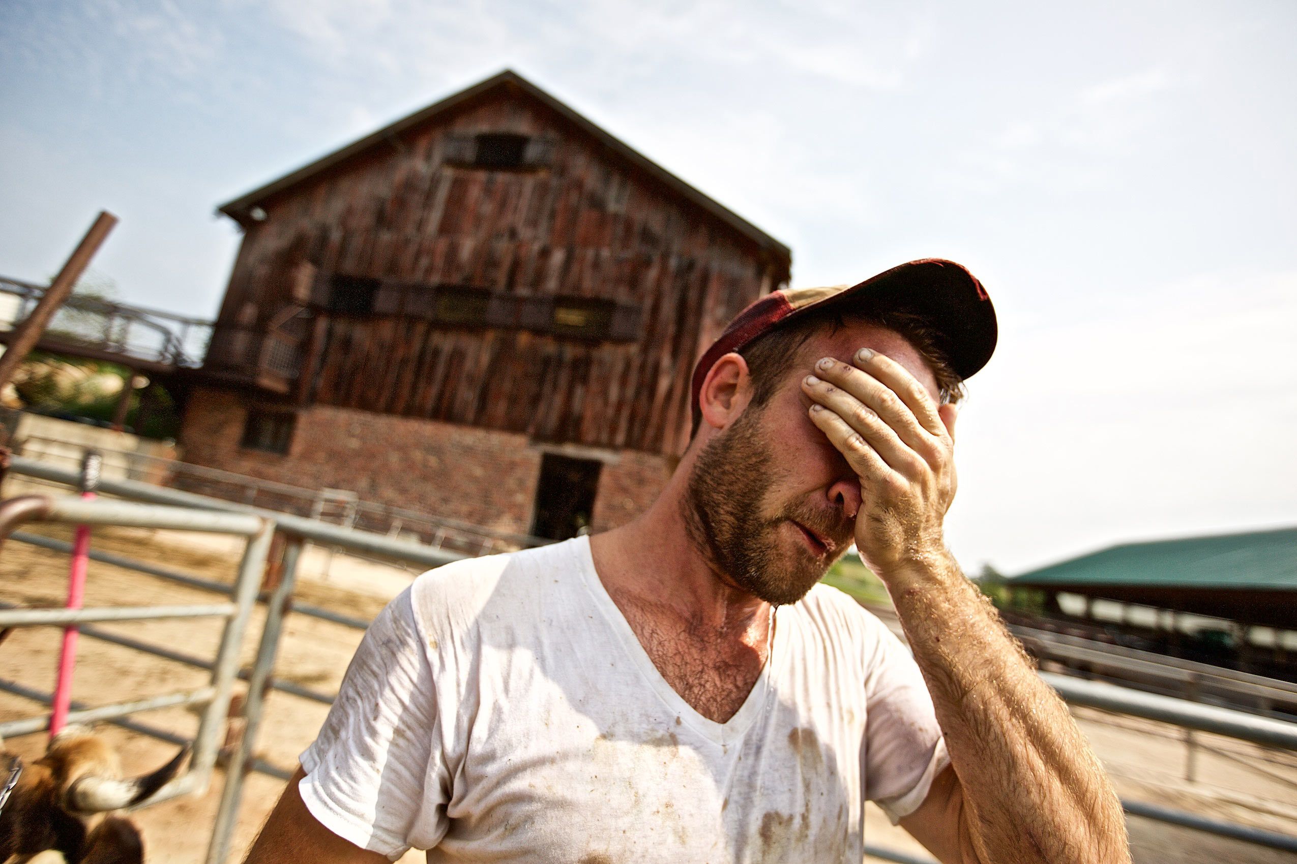 Farmer Wiping His Face IN Exhaution