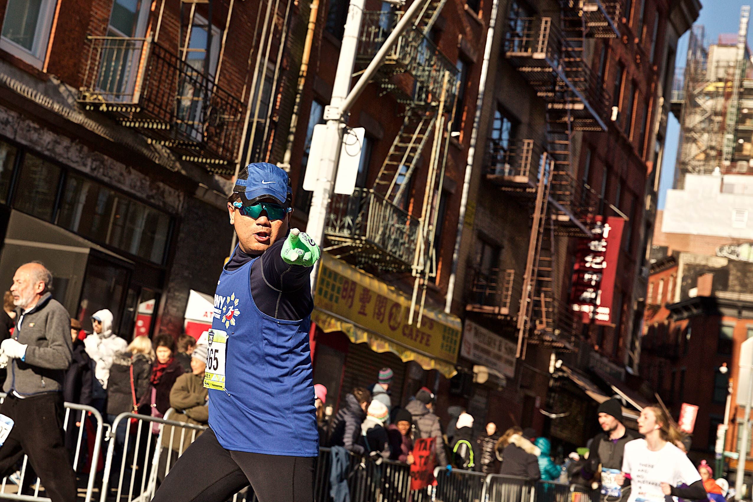 Intense Man Running & Pointing