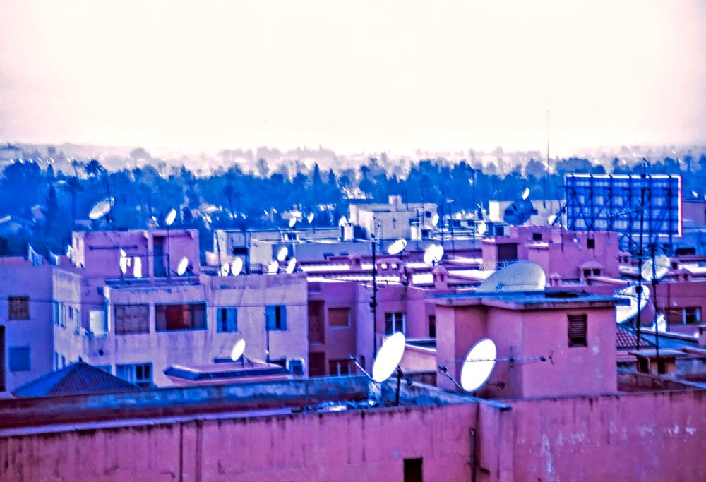 When you live in a suppressed culture, the only link to the rest of the world is the satellite dish. Chaouen, Morocco Satellite roofs.