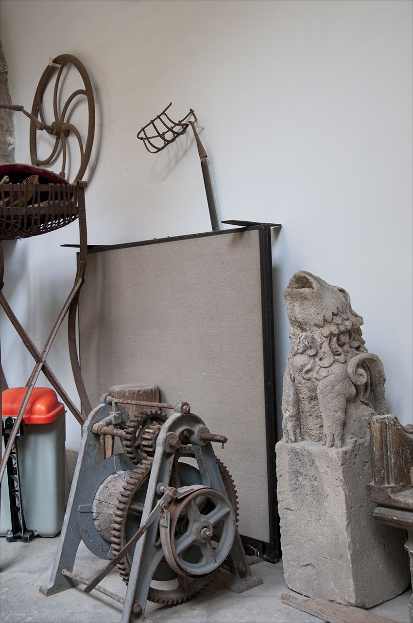 His friends are rusting machines and other unknowns. Toledo, Spain. A stone dog howling in the corner.