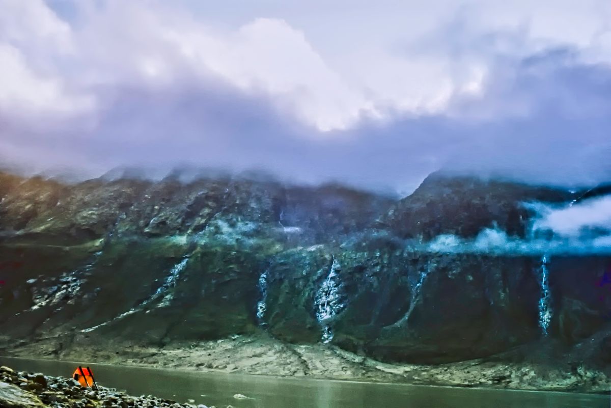A very accommodating emergency shelter with a six waterfall view. Three or four days from base camp. Baffin Island, Nunavut, Canada.