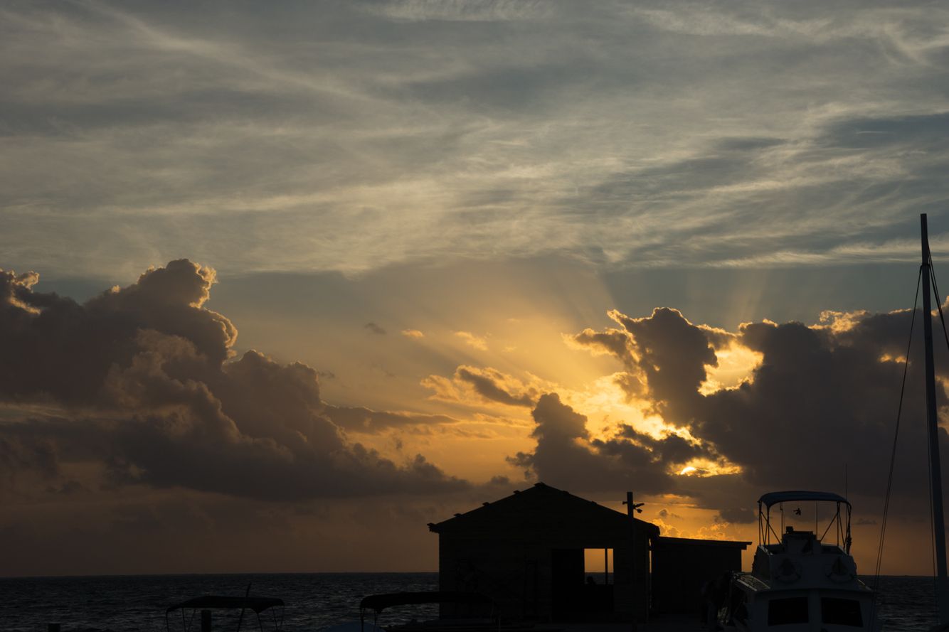 Sunrise on the dock. Caye Caulker,  Belize.