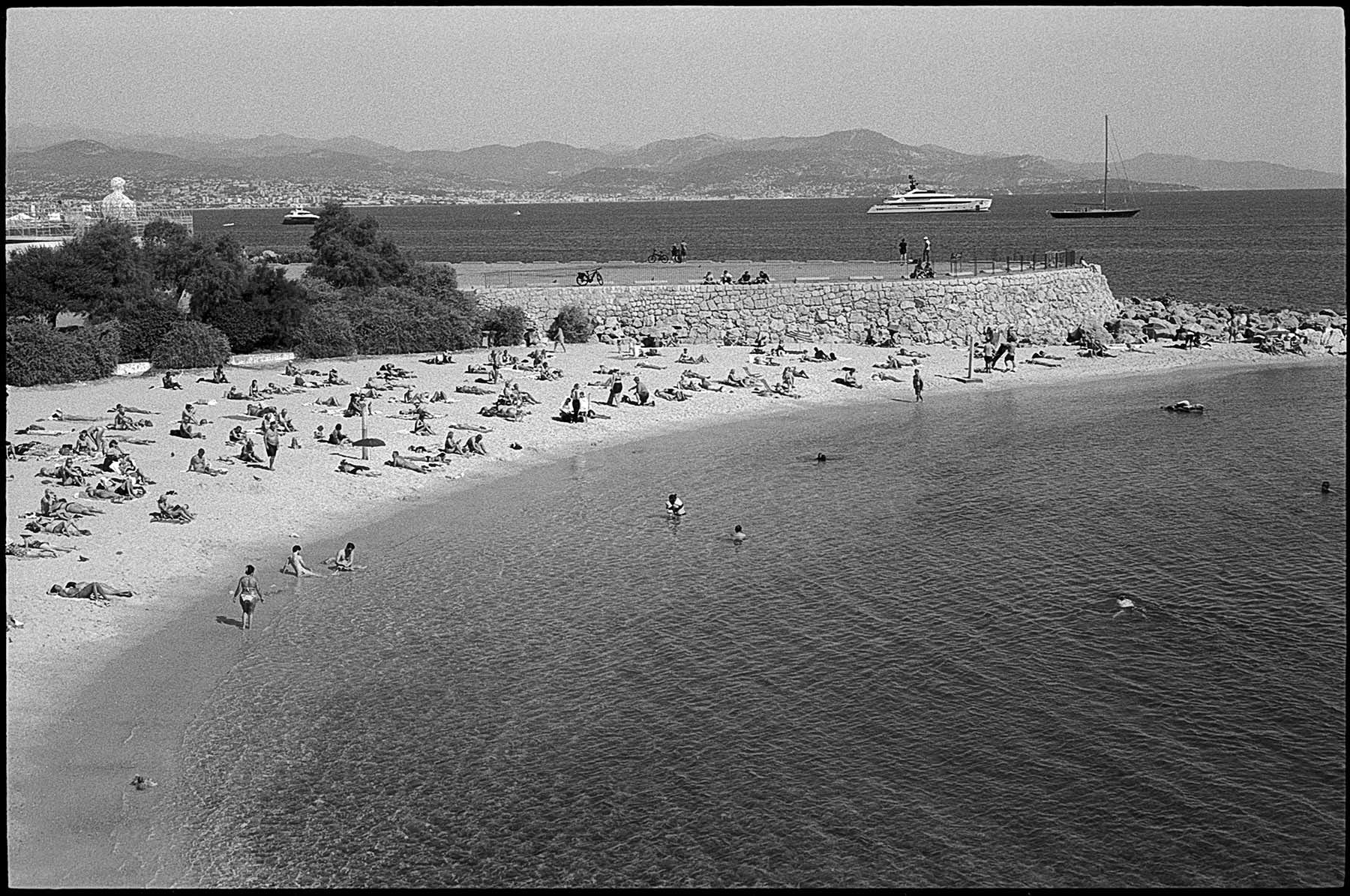 Nice, France, beach, bathers, swimmers, yacht, coastline, b&w, film, Stephen Collector