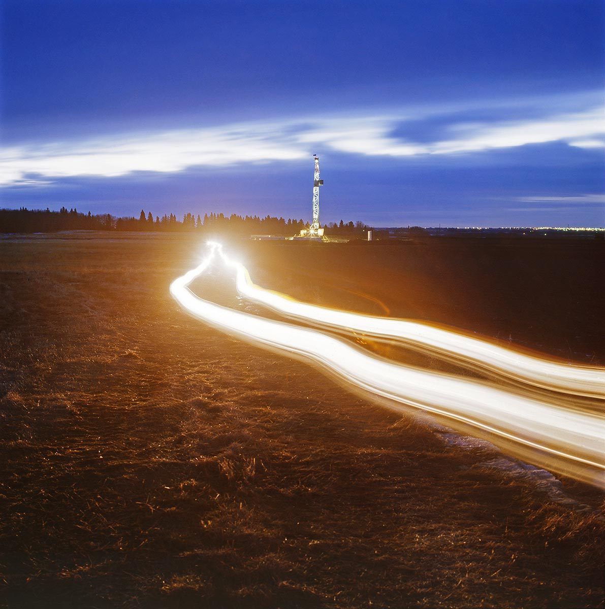 Shot taken in the field for Oil and Gas Annual Report taken in Alberta, Canada Oil Rig time exposure