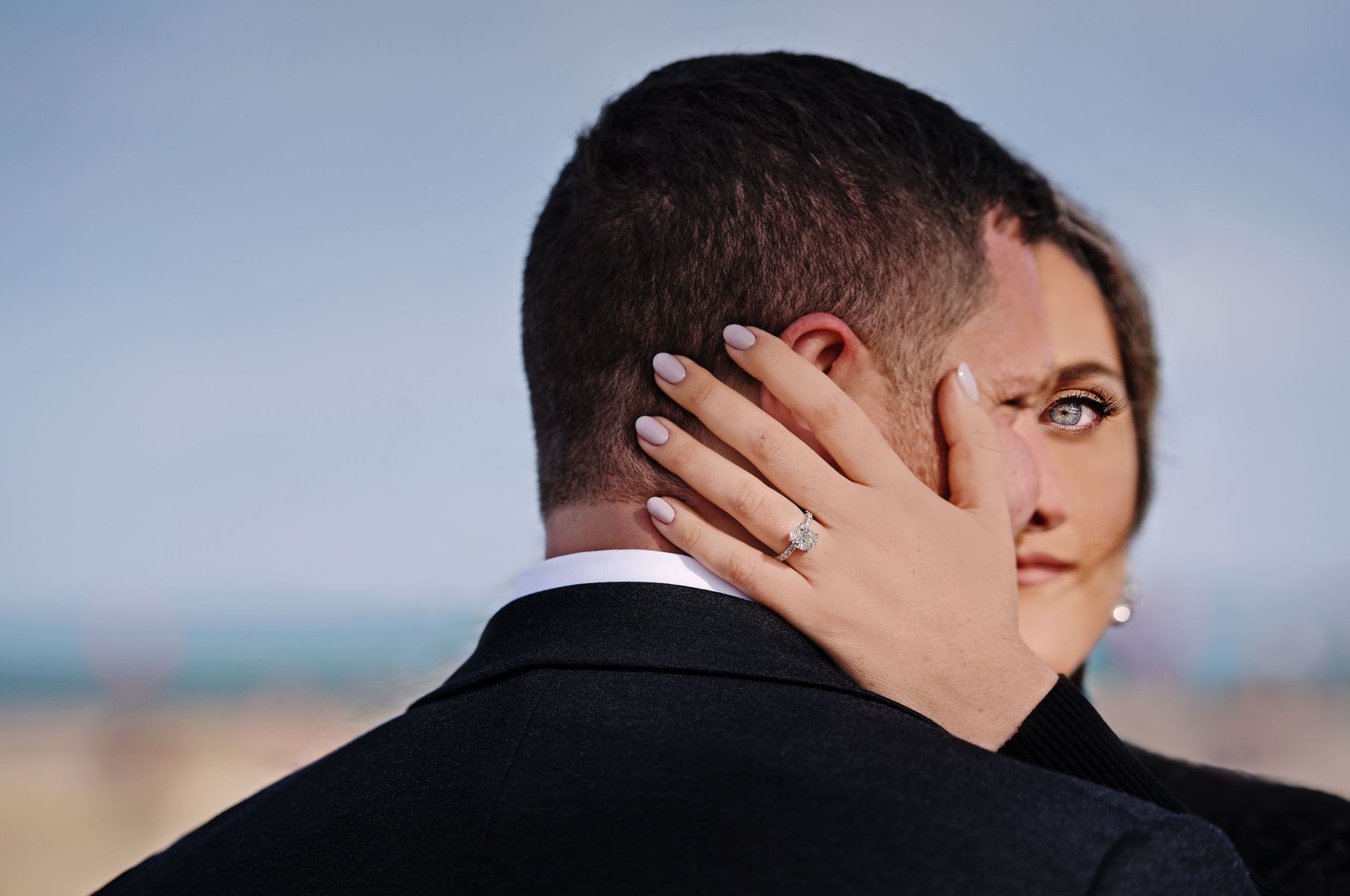Engagement photos by Lake Michigan in Chicago