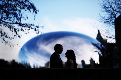 Couple in front of cloud gate, the Bean Engagement photos at Millennium park Chicago