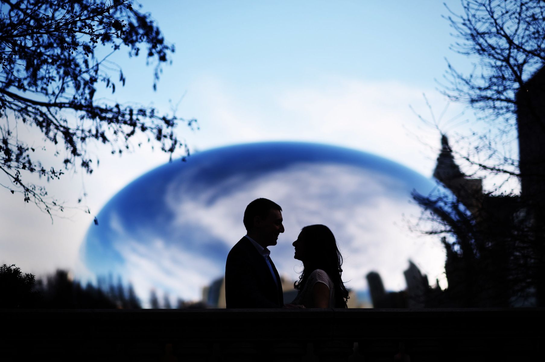 Couple in front of cloud gate, the Bean Engagement photos at Millennium park Chicago