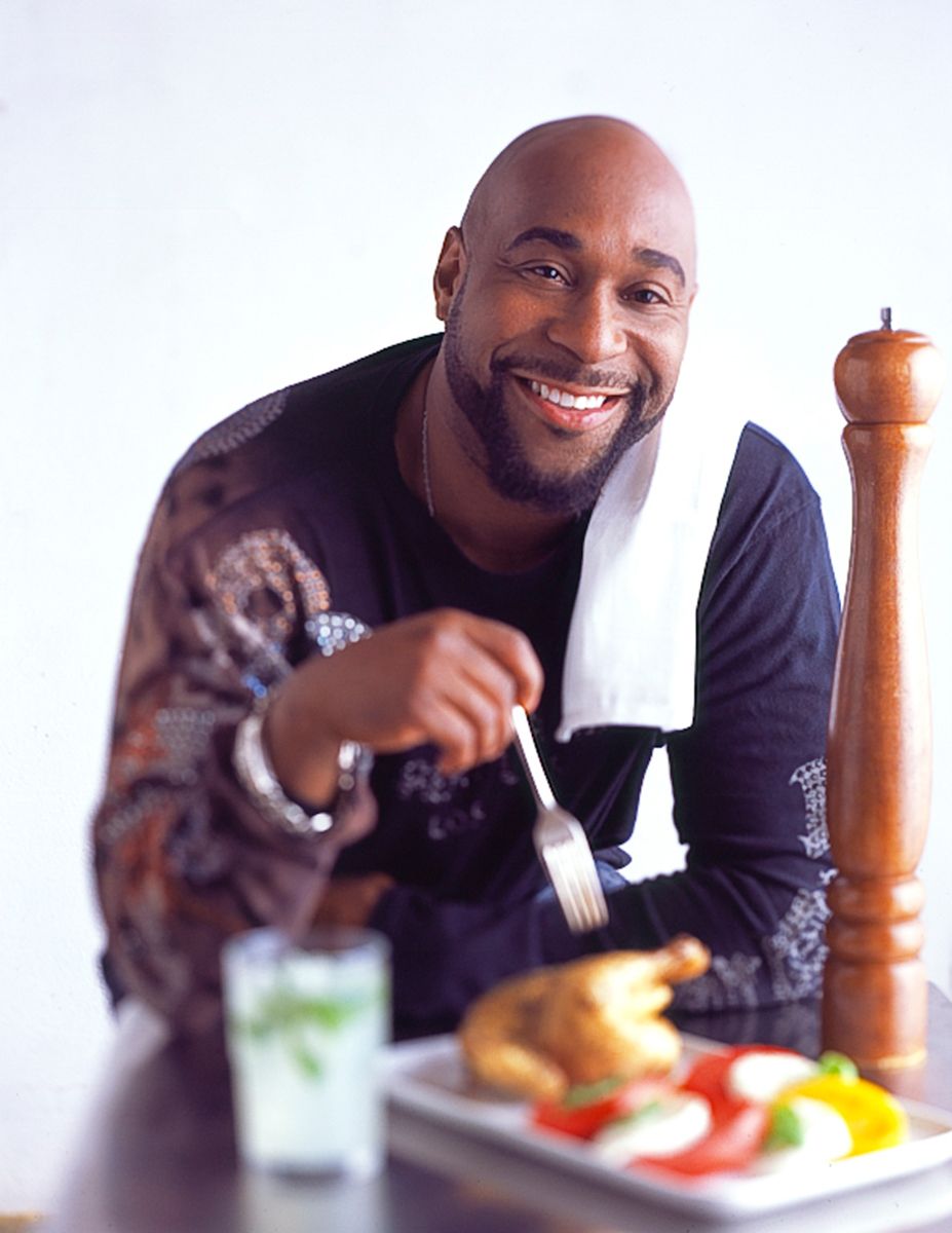 Portrait of G. Garvin with platter of chicken and hierloom tomatoes for Cookbook "Make it Super Simple"www.rkjacobs.comTop Food Photographer New York Seattle PortlandRobert Jacobs Photography ©2013